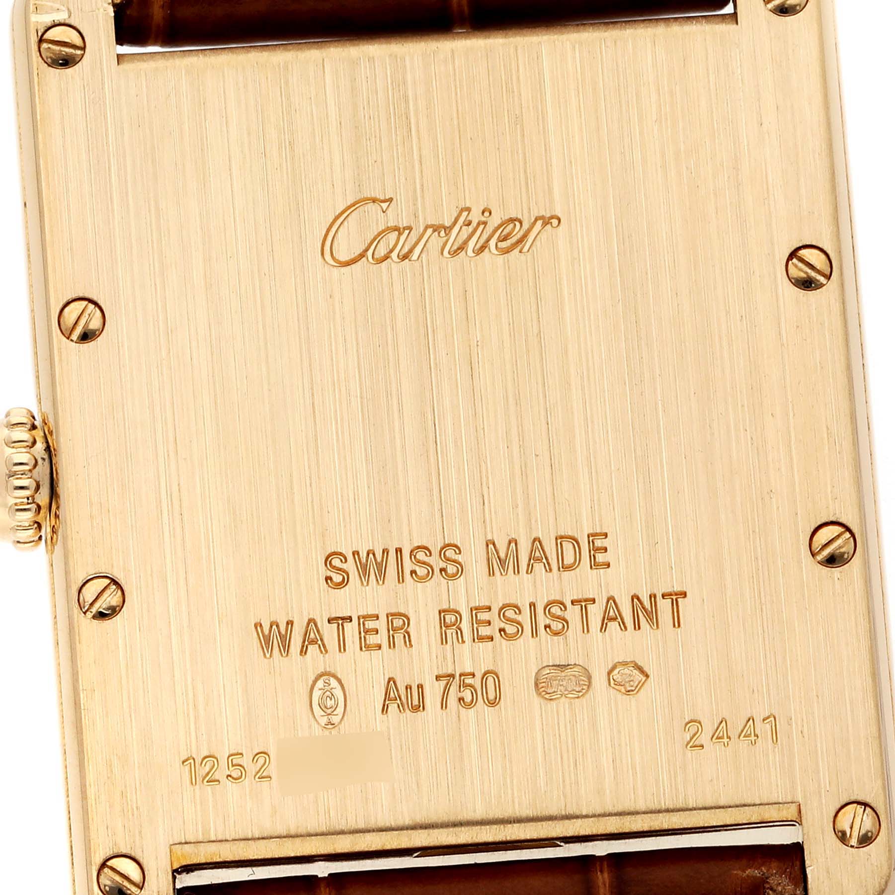 The image shows the back case of a Cartier Tank Louis W1529756 Men
s Yellow Gold Silver Dial W1529756 Men
s Yellow Gold Silver Dial watch, including the brand name, specifications, and serial numbers.