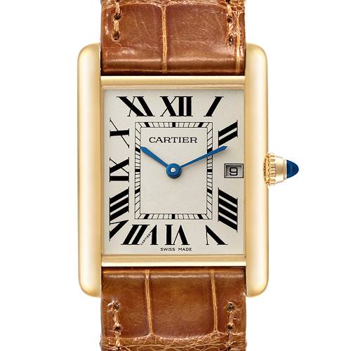 The image shows a frontal view of the Cartier Tank Louis watch, highlighting its dial, brown leather strap, and rectangular case.