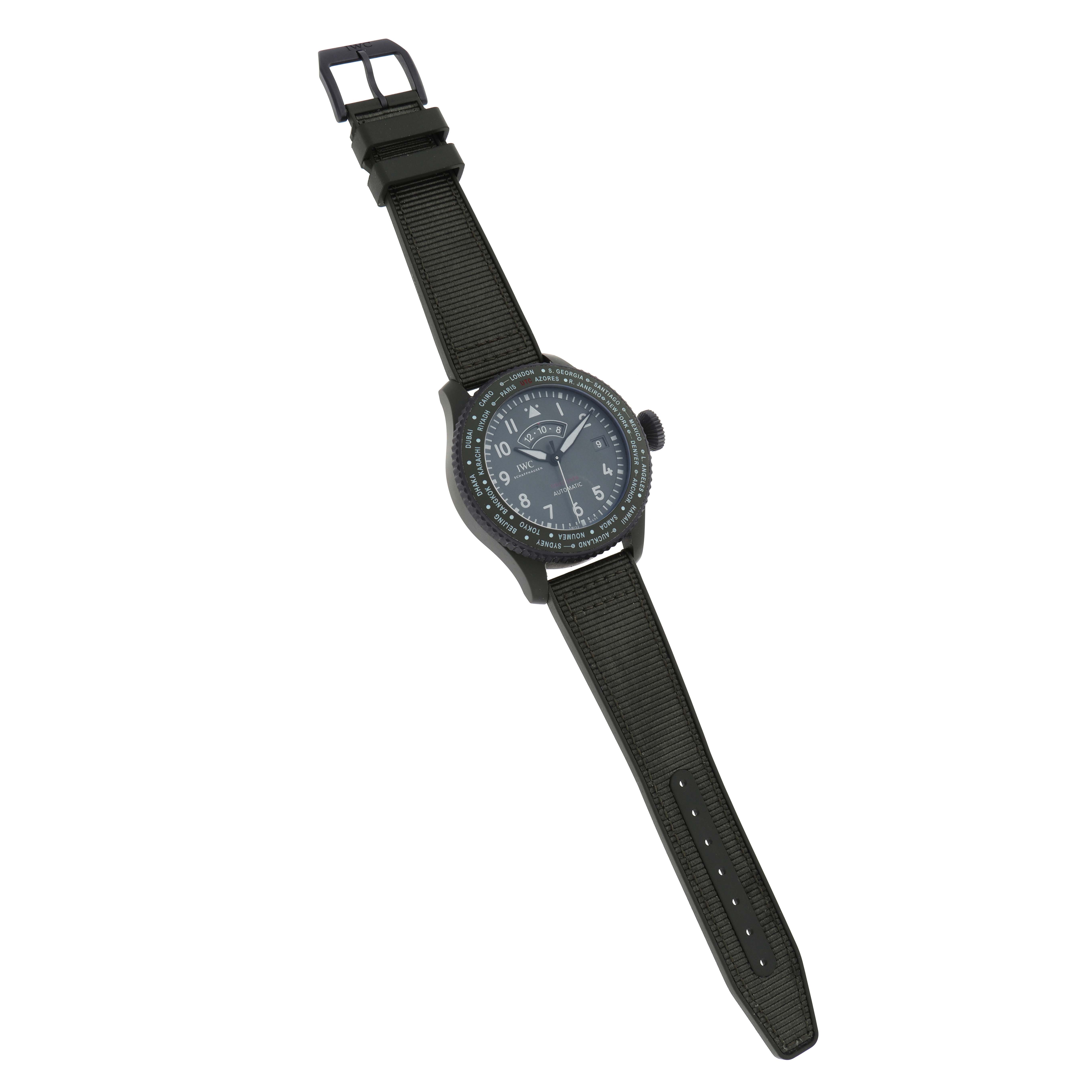 The IWC Pilot IW395601 Men
s Ceramic Green Dial model watch is shown at a three-quarter angle, displaying its face, bezel, crown, and NATO strap.