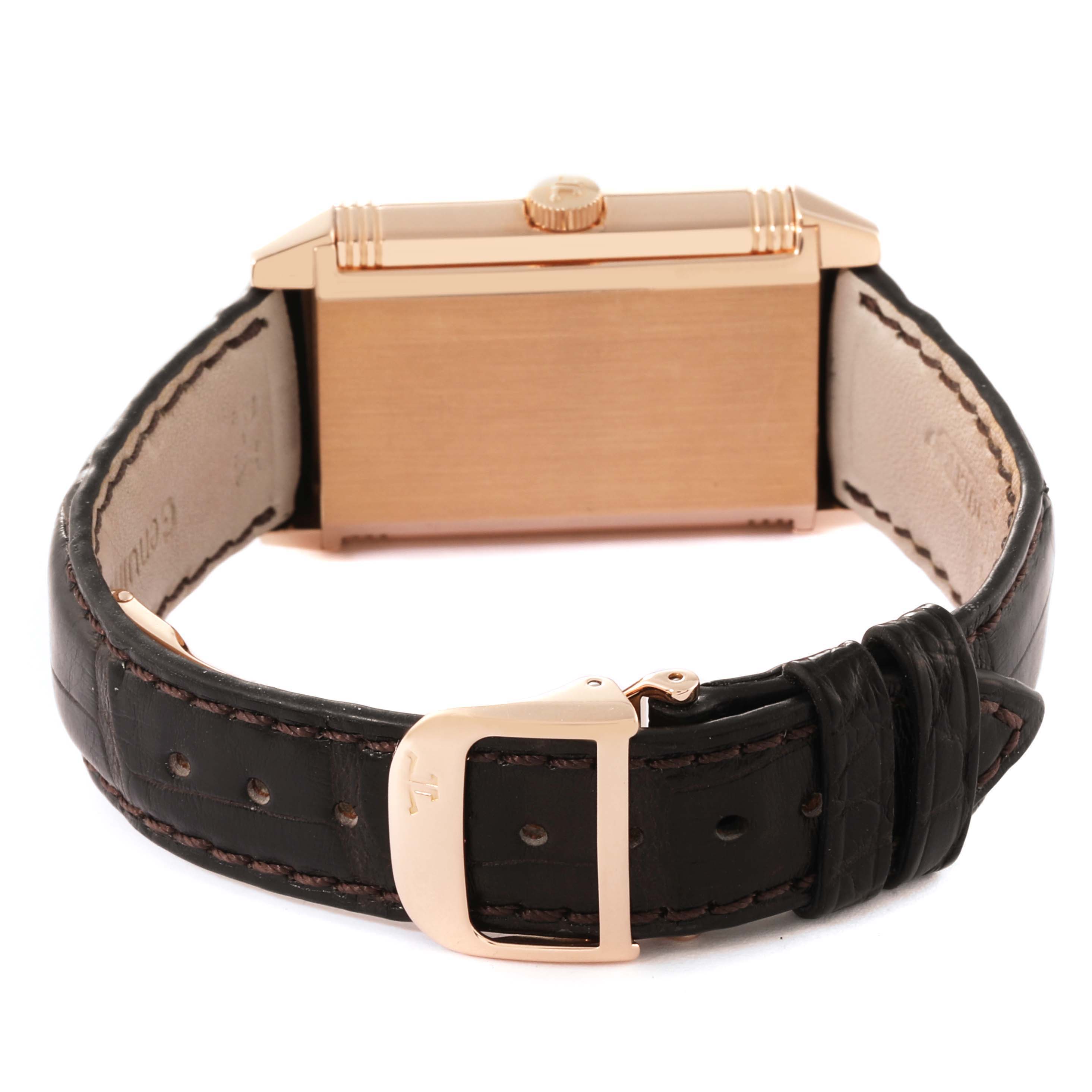 The image shows the back and side of the Jaeger LeCoultre Reverso Q2702420 Men's Rose Gold Silver Dial Q2702420 Men's Rose Gold Silver Dial watch, with a focus on the leather strap and buckle.