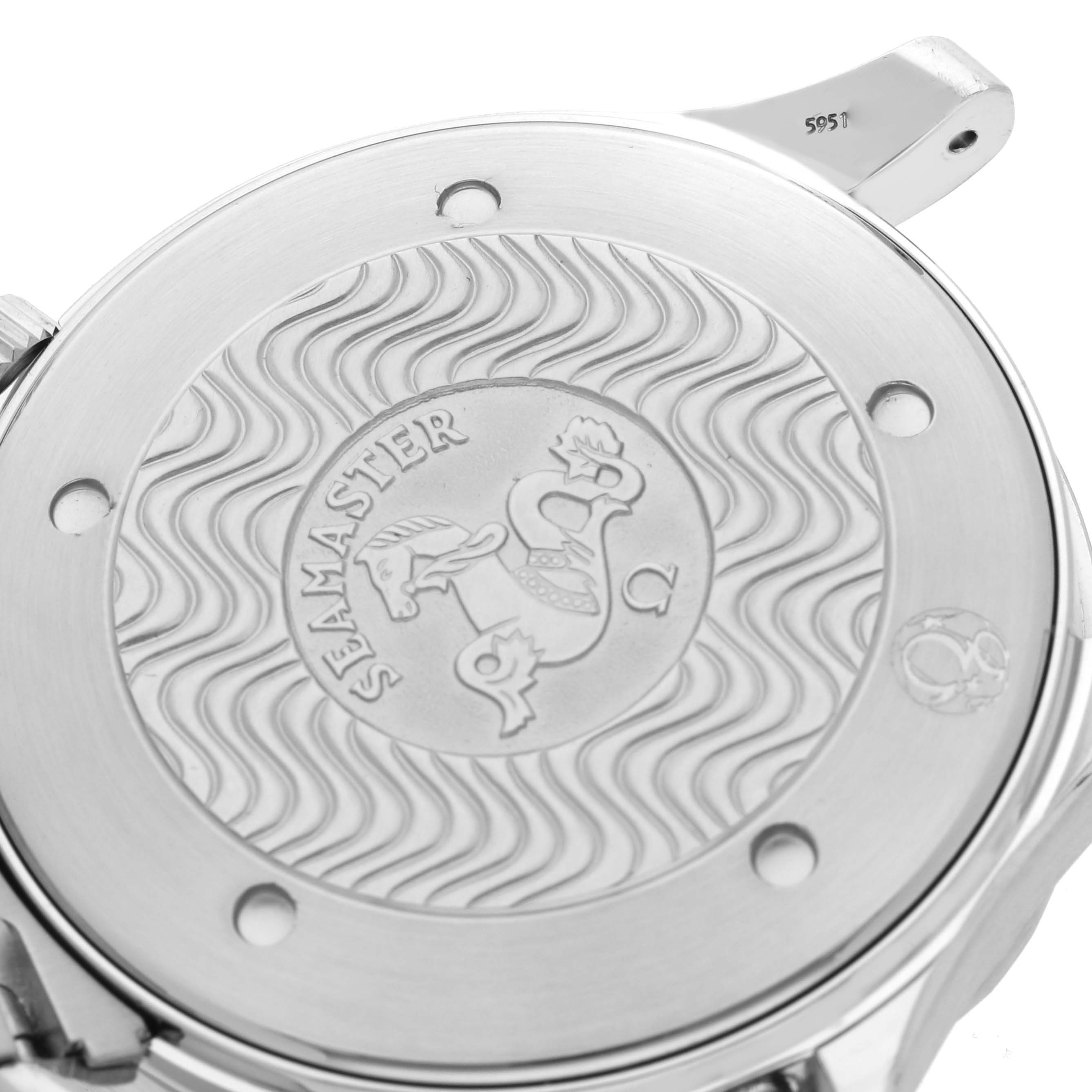 The image shows the case back of an Omega Seamaster 2541.80.00 Men
s Stainless Steel Blue Dial watch, featuring the engraved logo and wave pattern.