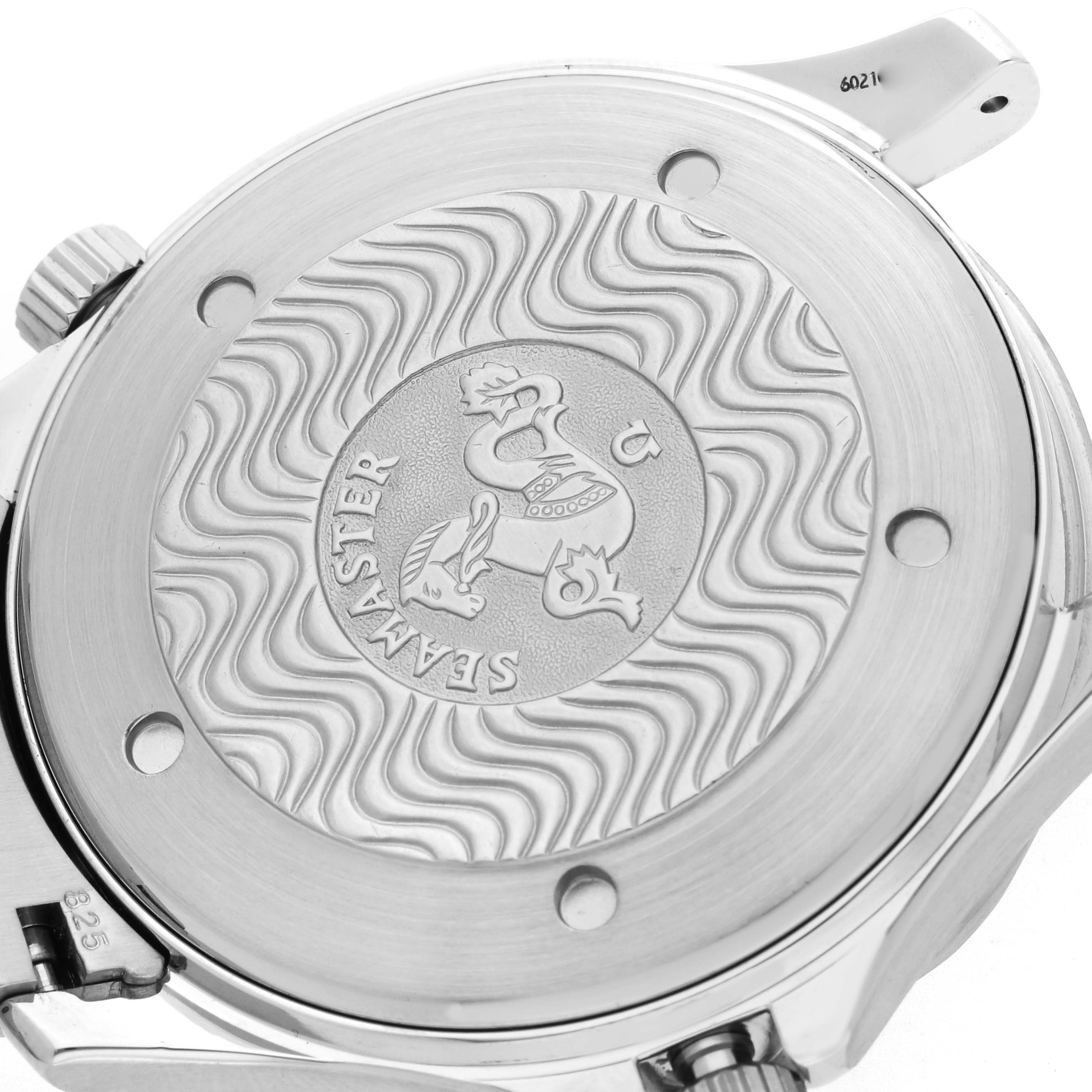 The image shows the case back of an Omega Seamaster 2531.80.00 Men
s Stainless Steel Blue Dial watch with engraved wavy patterns and a central logo.