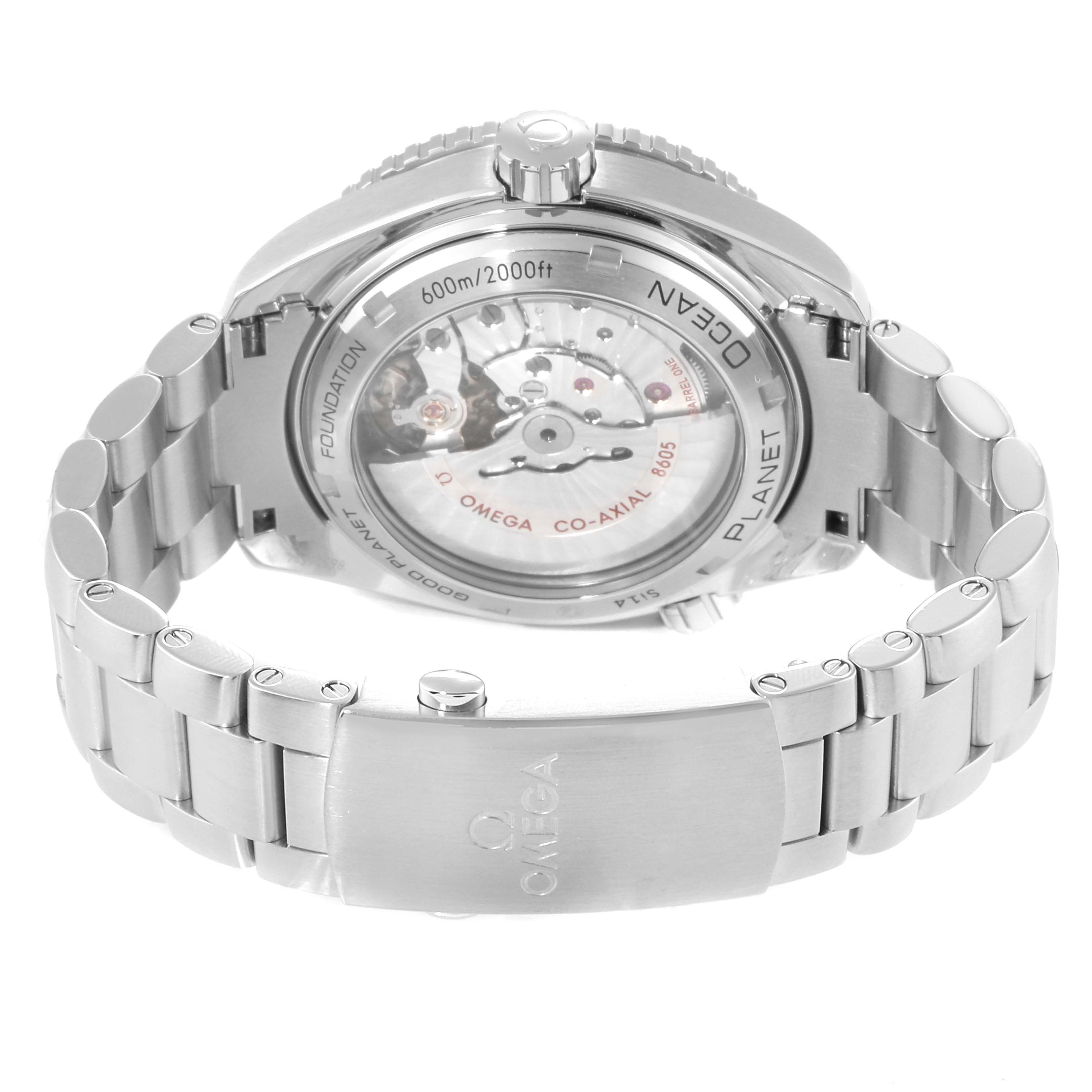 The image shows the back view and bracelet of an Omega Planet Ocean 232.30.44.22.03.001 Men's Stainless Steel Blue Dial 232.30.44.22.03.001 Men's Stainless Steel Blue Dial watch, highlighting its transparent case back and clasp.