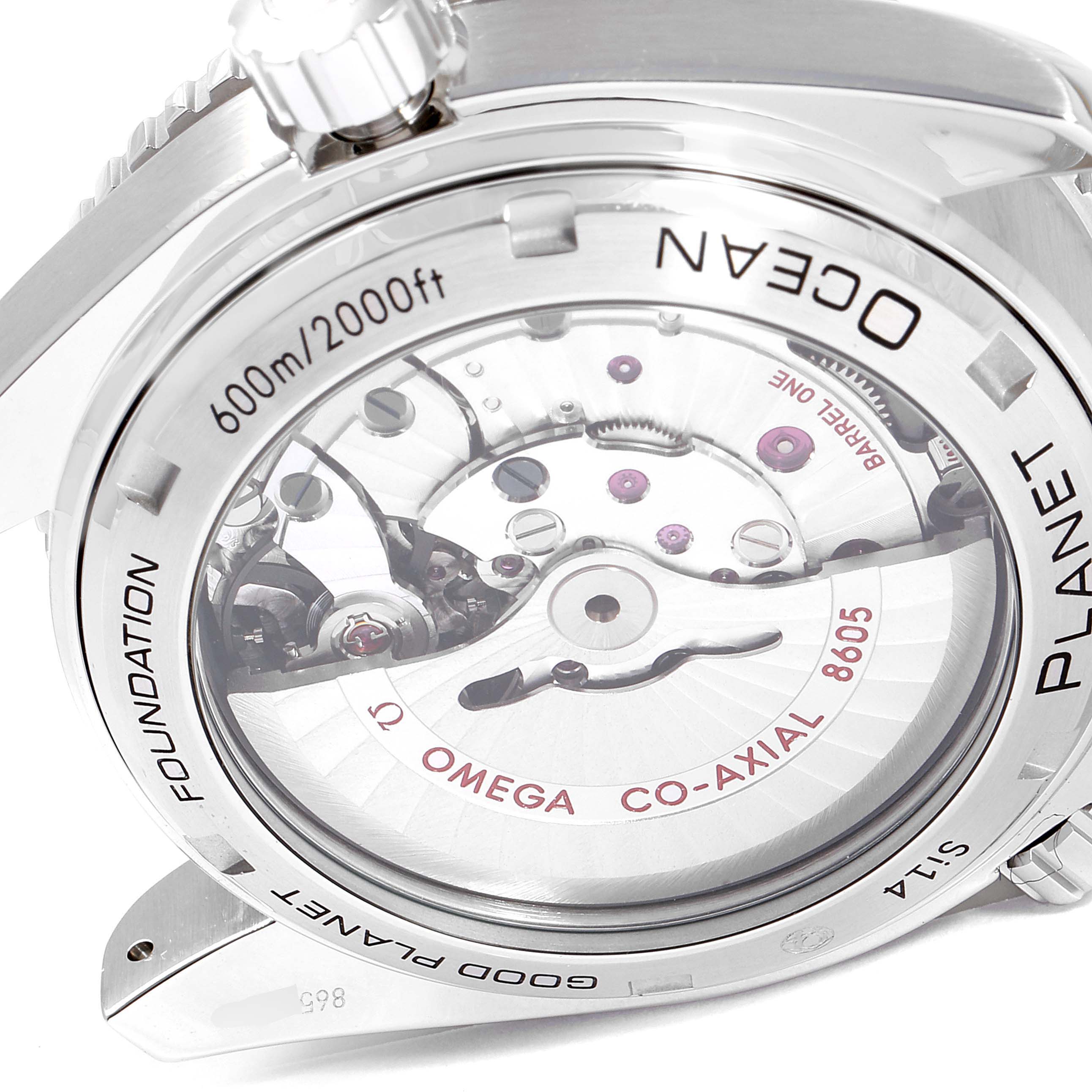 This image shows the rear view of an Omega Planet Ocean 232.30.44.22.03.001 Men's Stainless Steel Blue Dial 232.30.44.22.03.001 Men's Stainless Steel Blue Dial watch, highlighting its transparent case back and internal mechanics.