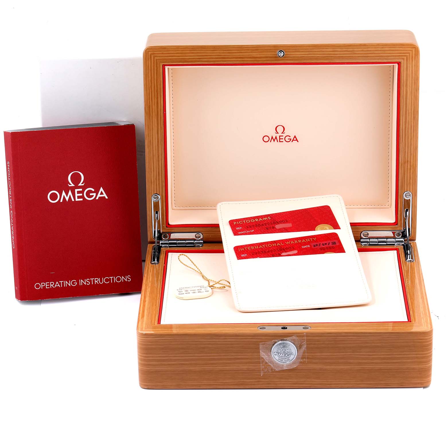 The image shows an Omega Planet Ocean 232.30.42.21.01.002 Men
s Stainless Steel Black Dial 232.30.42.21.01.002 Men
s Stainless Steel Black Dial watch
s packaging, warranty cards, and operating manual, displayed at a front angle.