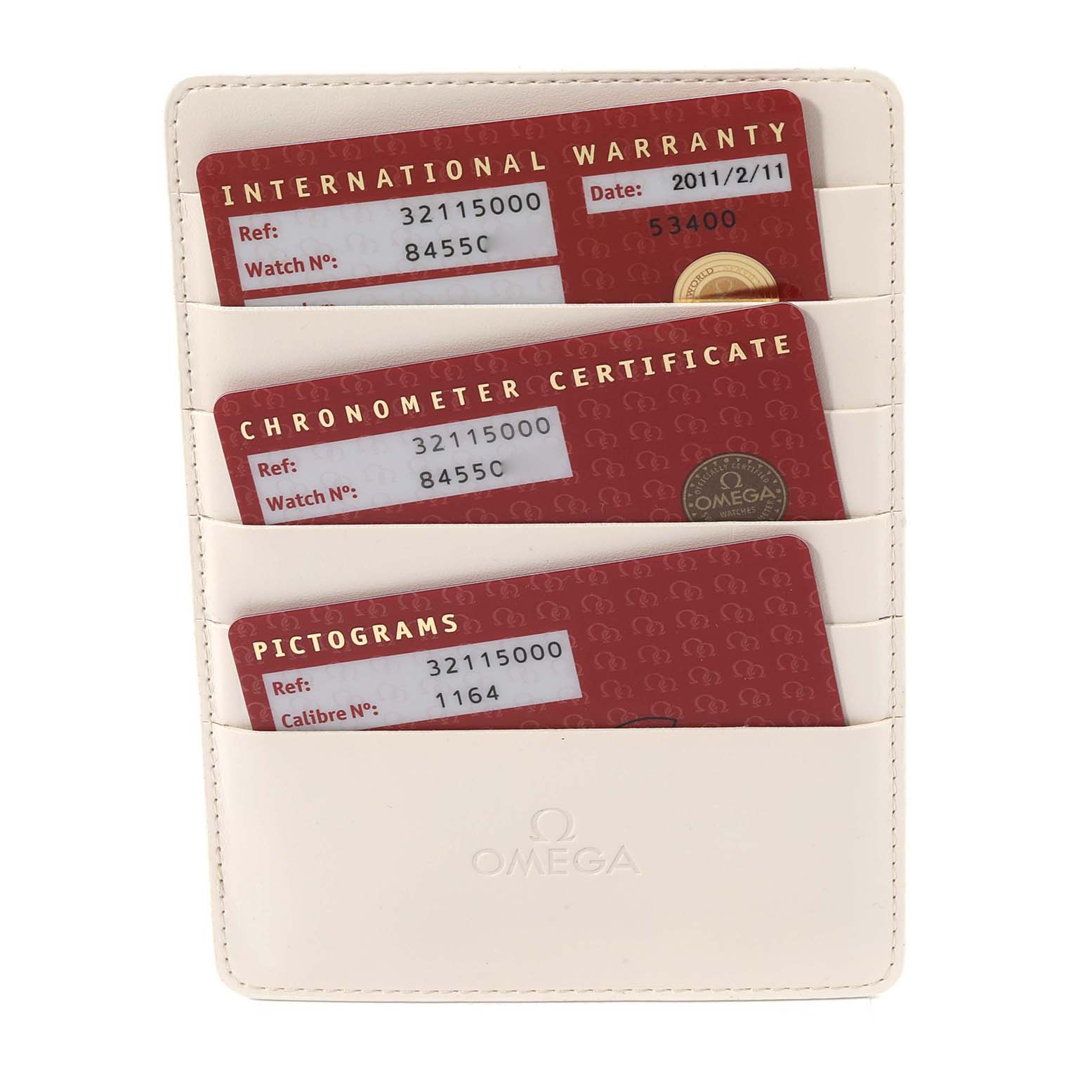 The image shows warranty and certificate cards for an Omega Speedmaster 3511.50.00 Men
s Stainless Steel Black Dial 3511.50.00 Men
s Stainless Steel Black Dial watch in a white cardholder.