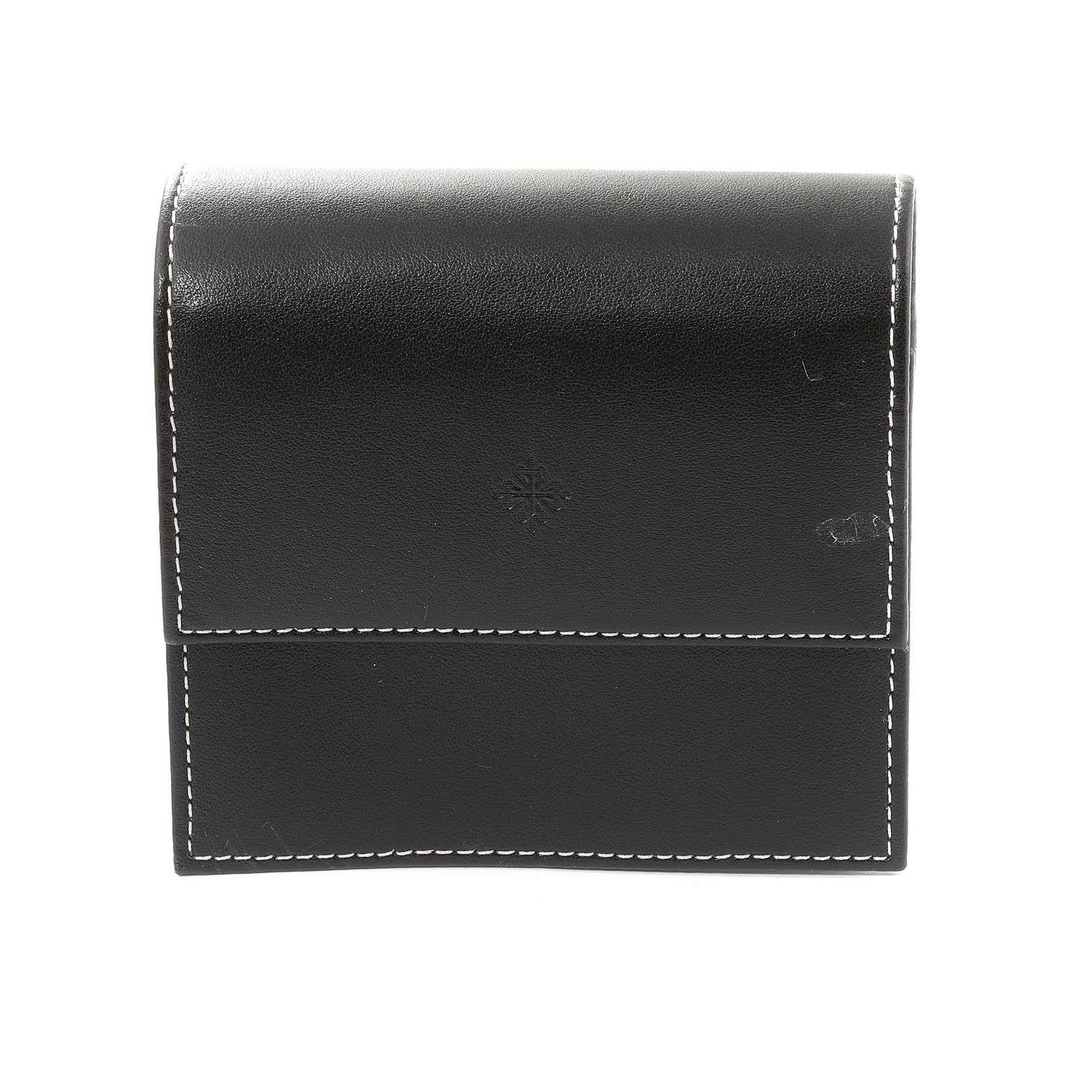 This image shows a closed black leather watch case for a Patek Philippe Calatrava 5120J-001 Men's Yellow Gold White Dial 5120J-001 Men's Yellow Gold White Dial model, viewed from the front.