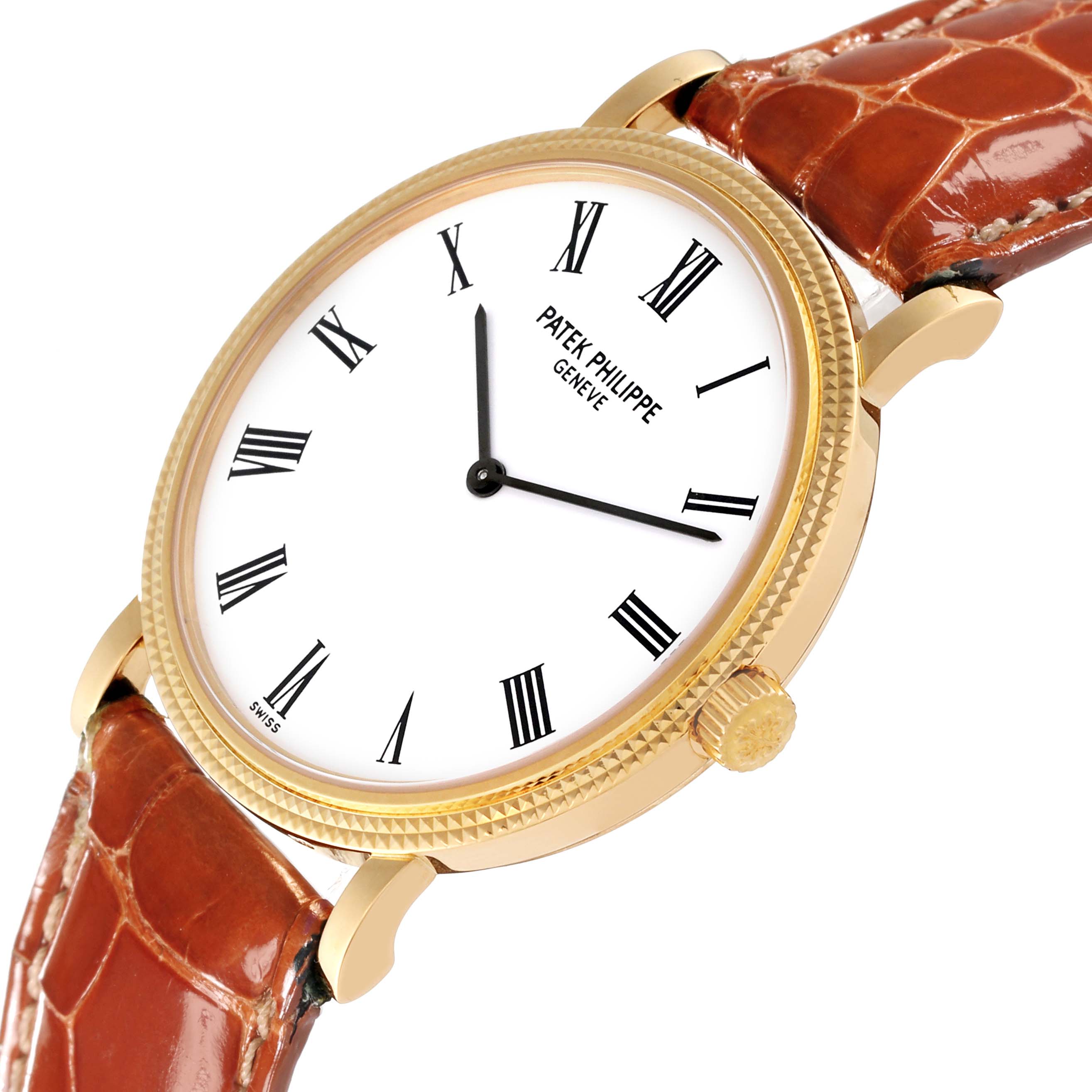 The image shows a Patek Philippe Calatrava 5120J-001 Men's Yellow Gold White Dial 5120J-001 Men's Yellow Gold White Dial watch from an angled close-up, focusing on its face, crown, and leather strap.