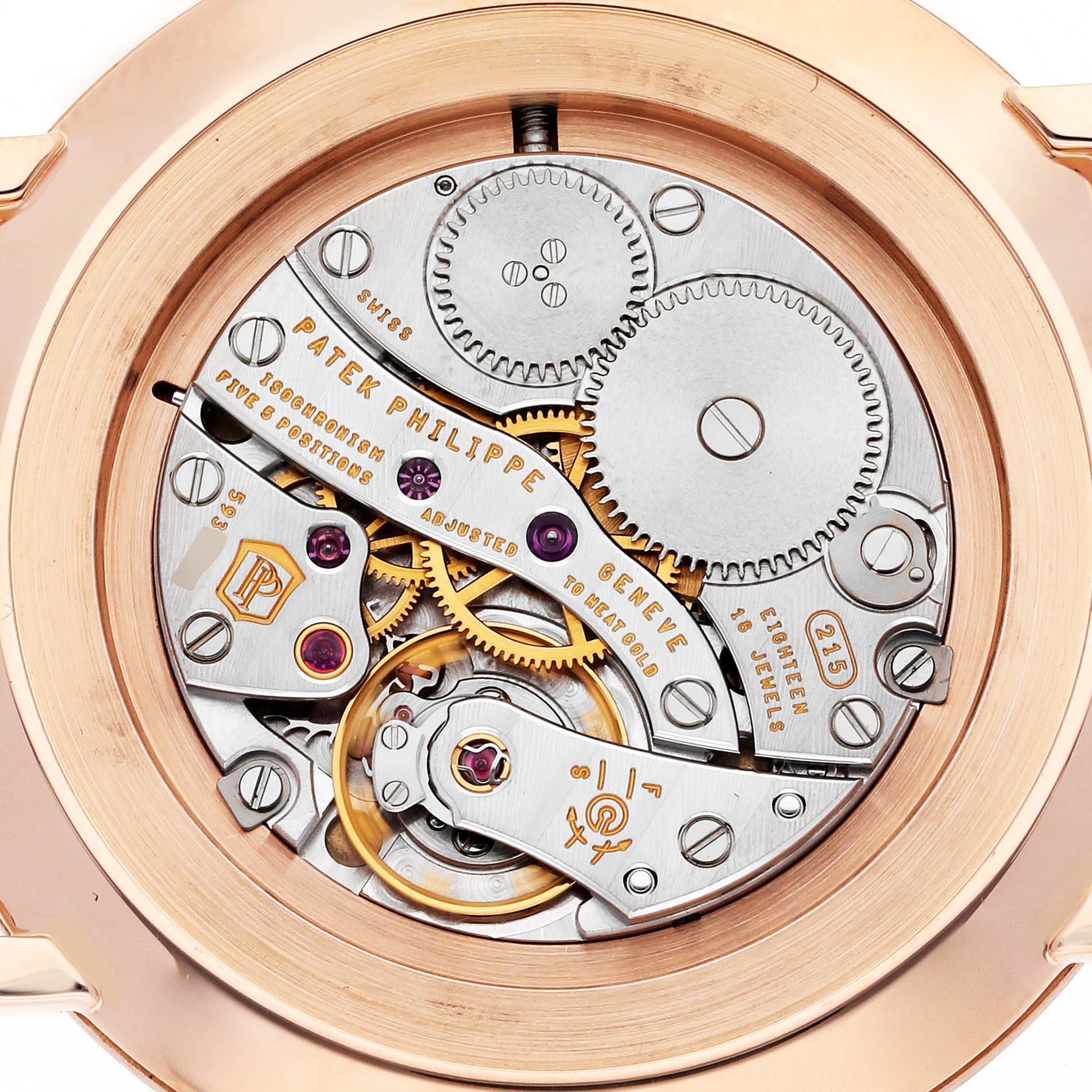 This is the backside of a Patek Philippe Calatrava 5119R-001 Men
s Rose Gold White Dial 5119R-001 Men
s Rose Gold White Dial watch, showing its exposed mechanical movement.