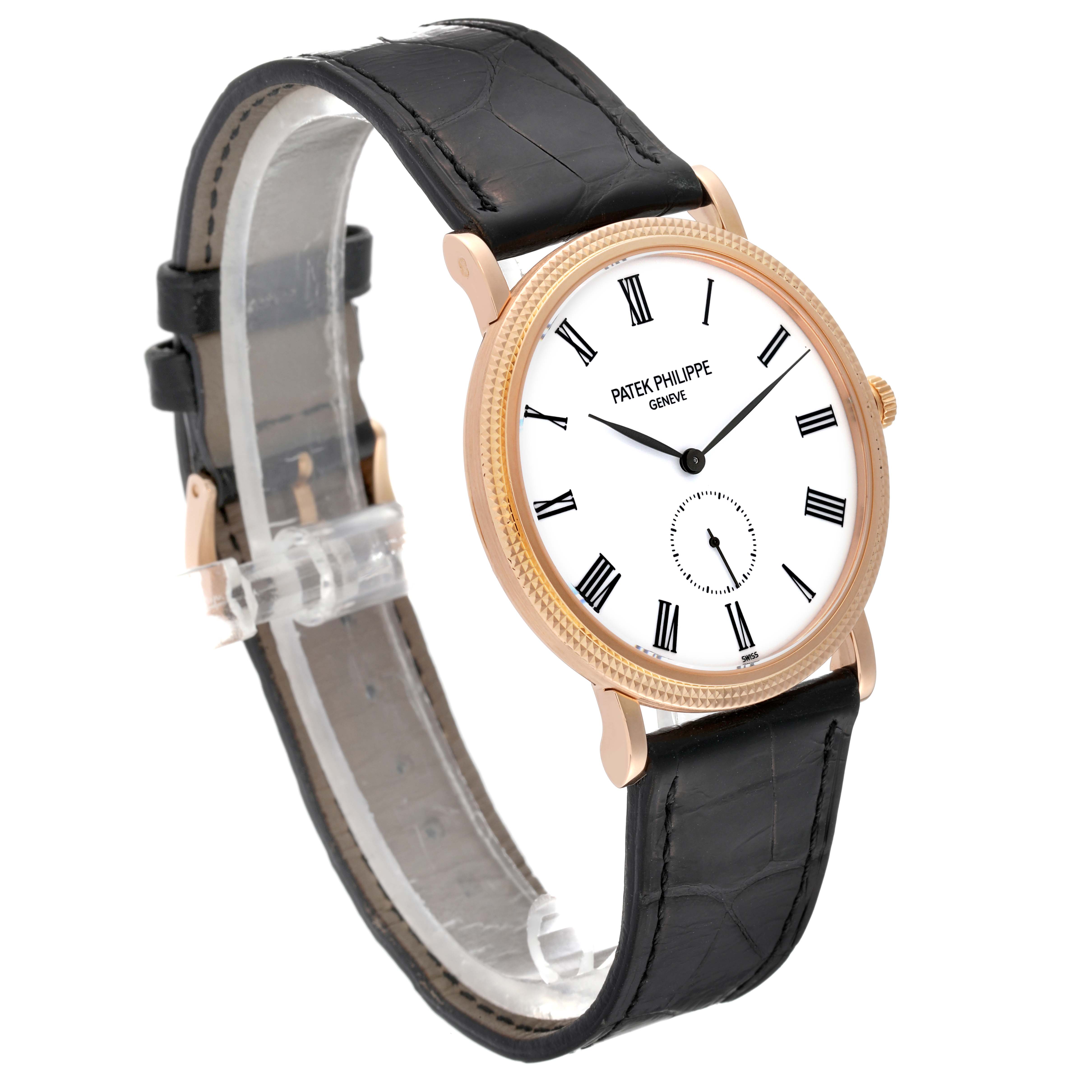 The image shows a Patek Philippe Calatrava 5119R-001 Men
s Rose Gold White Dial 5119R-001 Men
s Rose Gold White Dial watch at a three-quarter angle, highlighting the face, case, and leather strap.