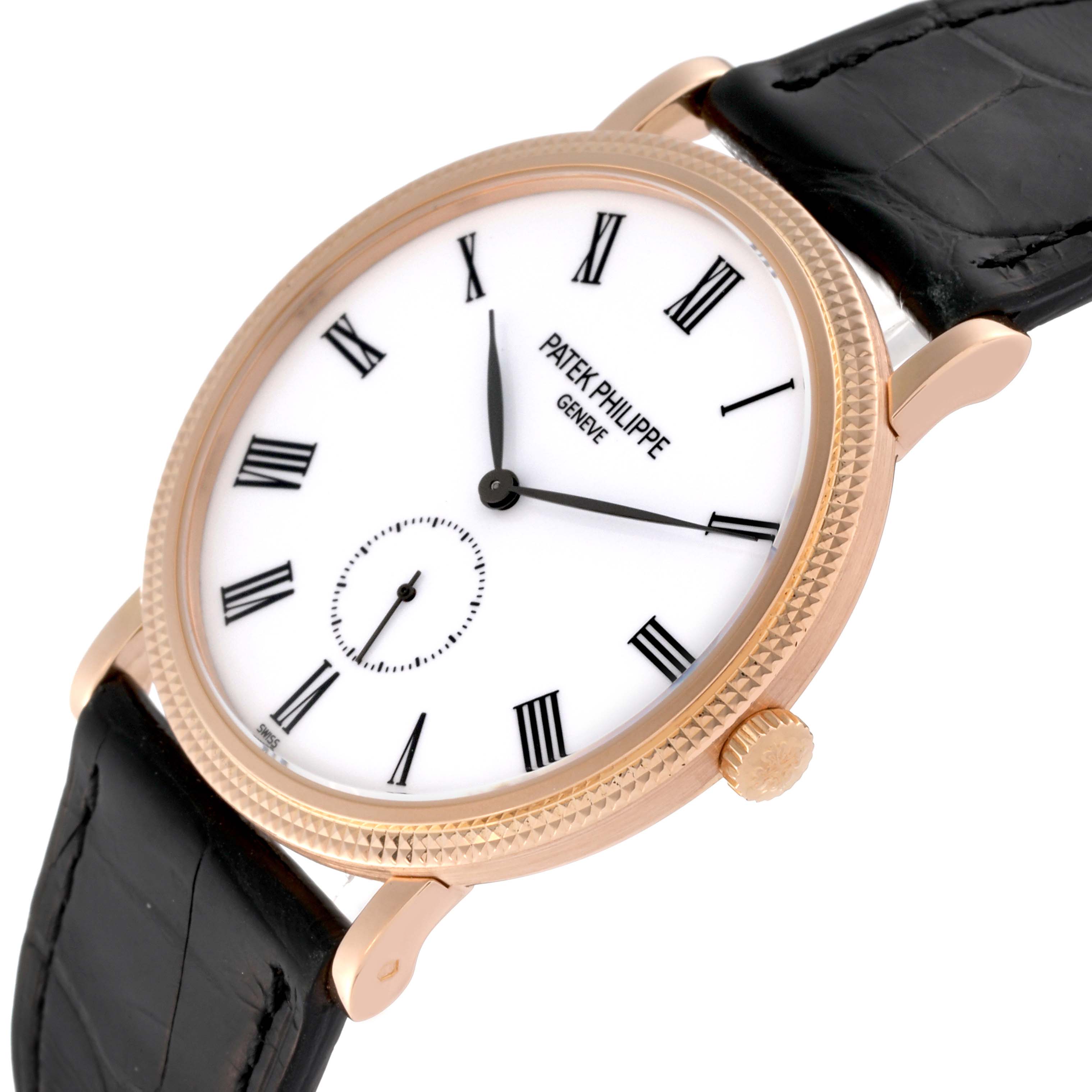 The image shows a close-up angled view of the Patek Philippe Calatrava 5119R-001 Men
s Rose Gold White Dial 5119R-001 Men
s Rose Gold White Dial watch, highlighting its dial, bezel, crown, and leather strap.