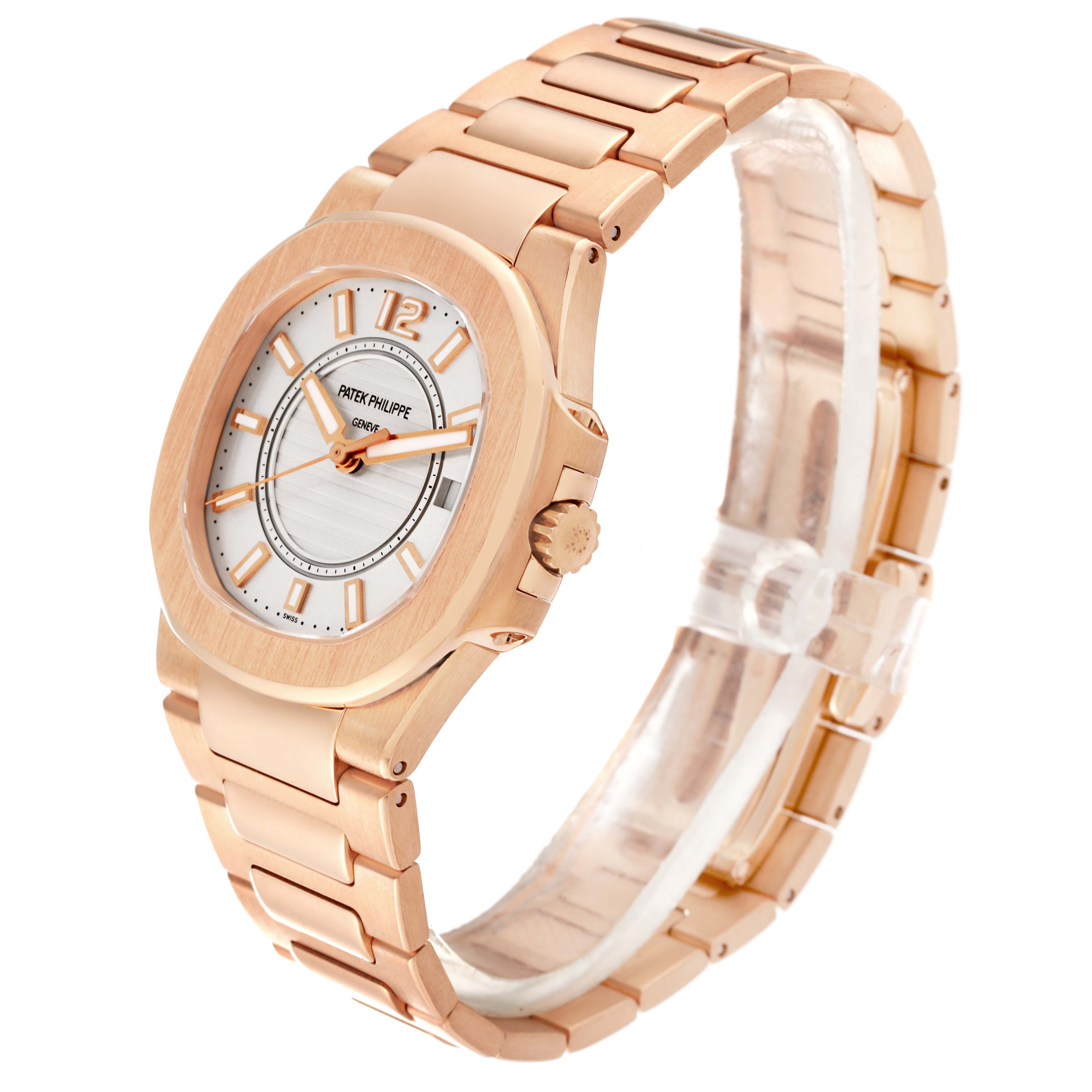 The image shows a side angle view of the Patek Philippe Nautilus 7011/1R-001 Women's Rose Gold Silver Dial 7011/1R-001 Women's Rose Gold Silver Dial watch, displaying its face, bezel, crown, and bracelet.