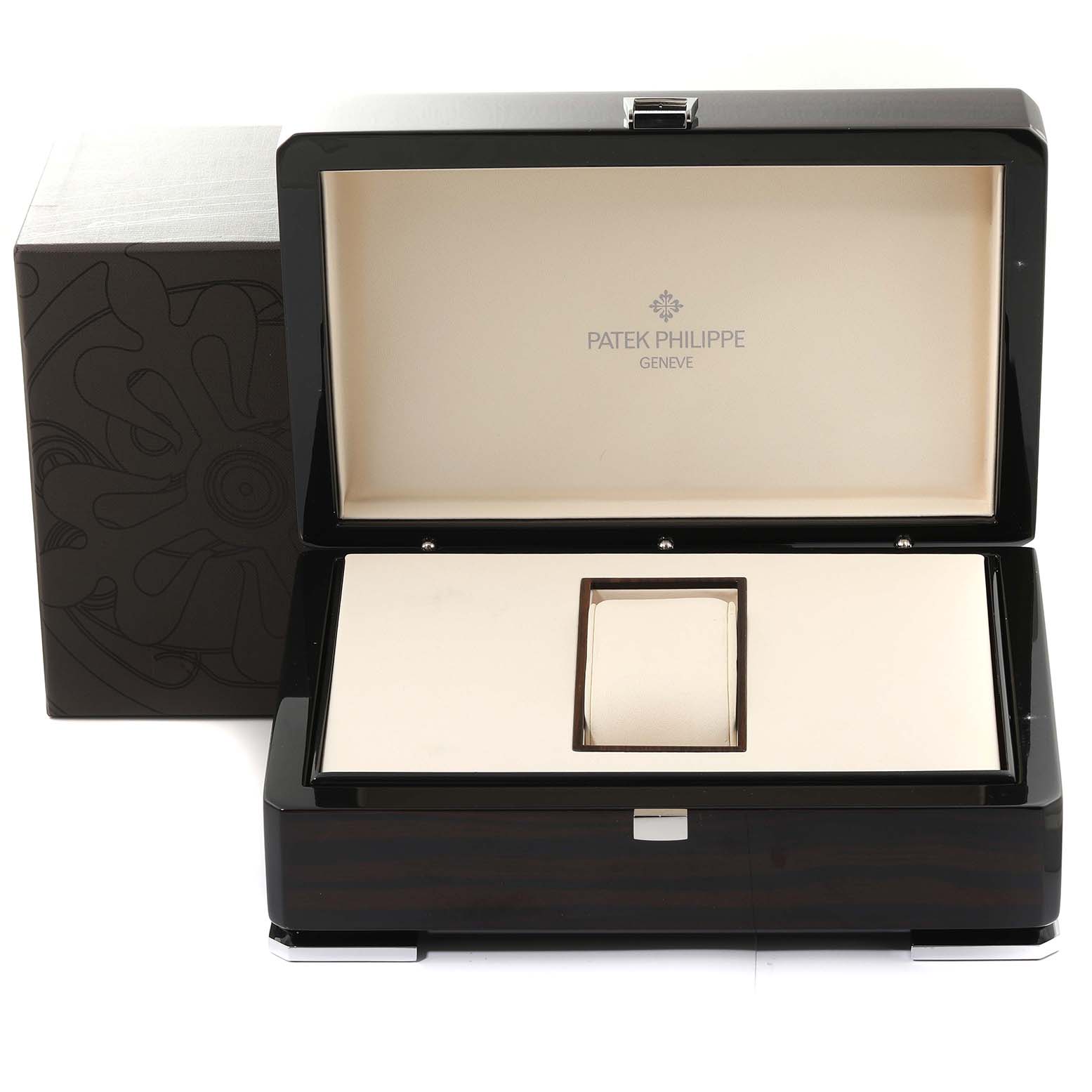 This image shows an open Patek Philippe Nautilus 7011/1R-001 Women's Rose Gold Silver Dial 7011/1R-001 Women's Rose Gold Silver Dial watch box and the foam cushion inside.
