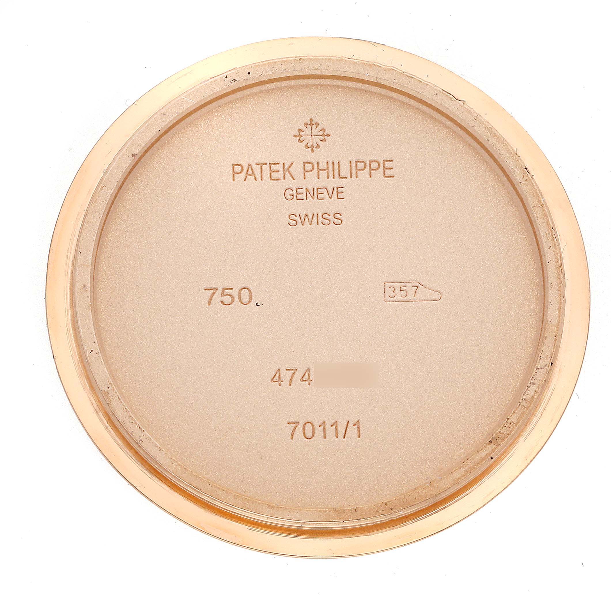 This image shows the back cover of a Patek Philippe Nautilus 7011/1R-001 Women's Rose Gold Silver Dial 7011/1R-001 Women's Rose Gold Silver Dial model watch, shown from a straight-on angle.