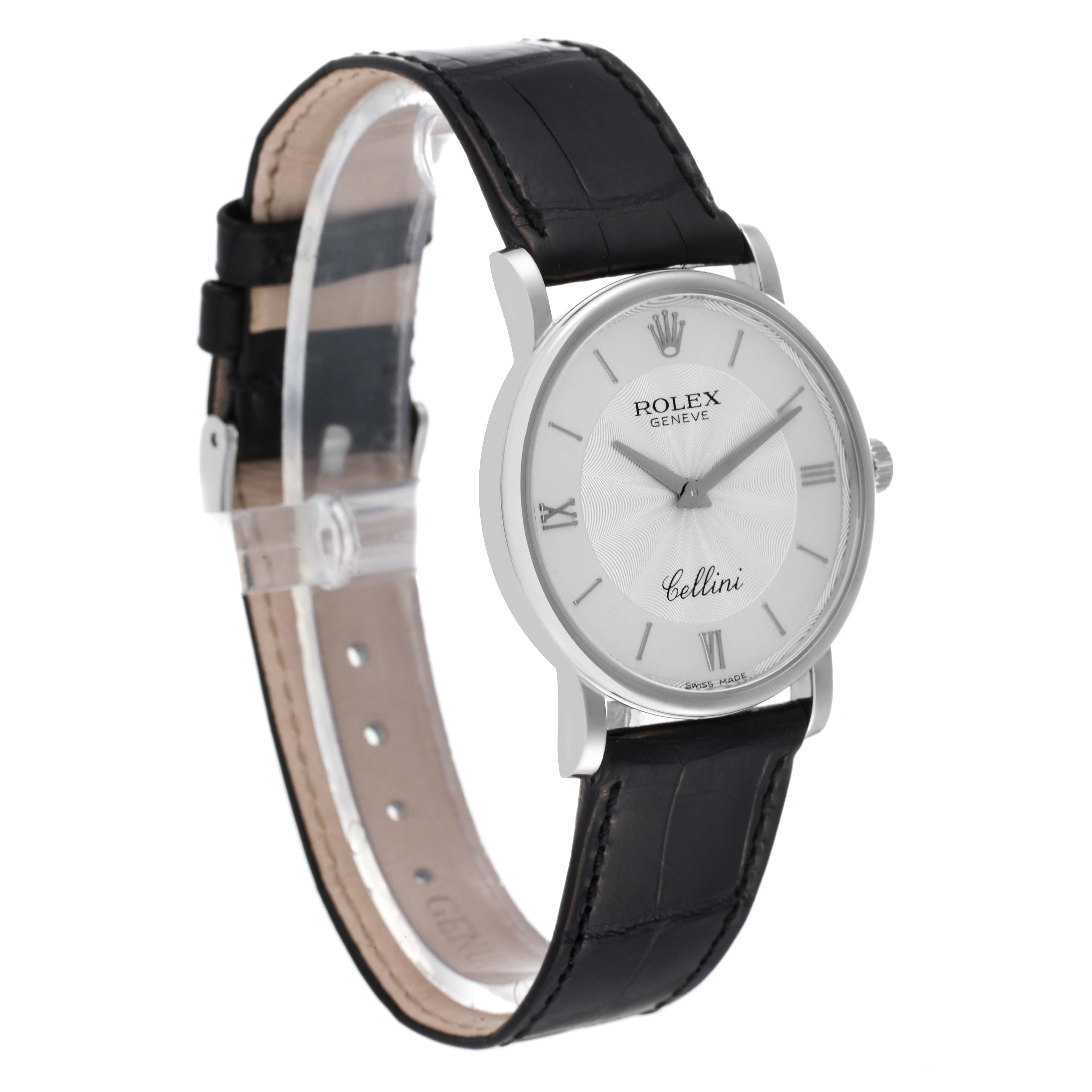 The image shows a Rolex Cellini 5115 Men's White Gold Silver Dial 5115 Men's White Gold Silver Dial watch angled slightly from the front, highlighting its face, bezel, and black leather strap.