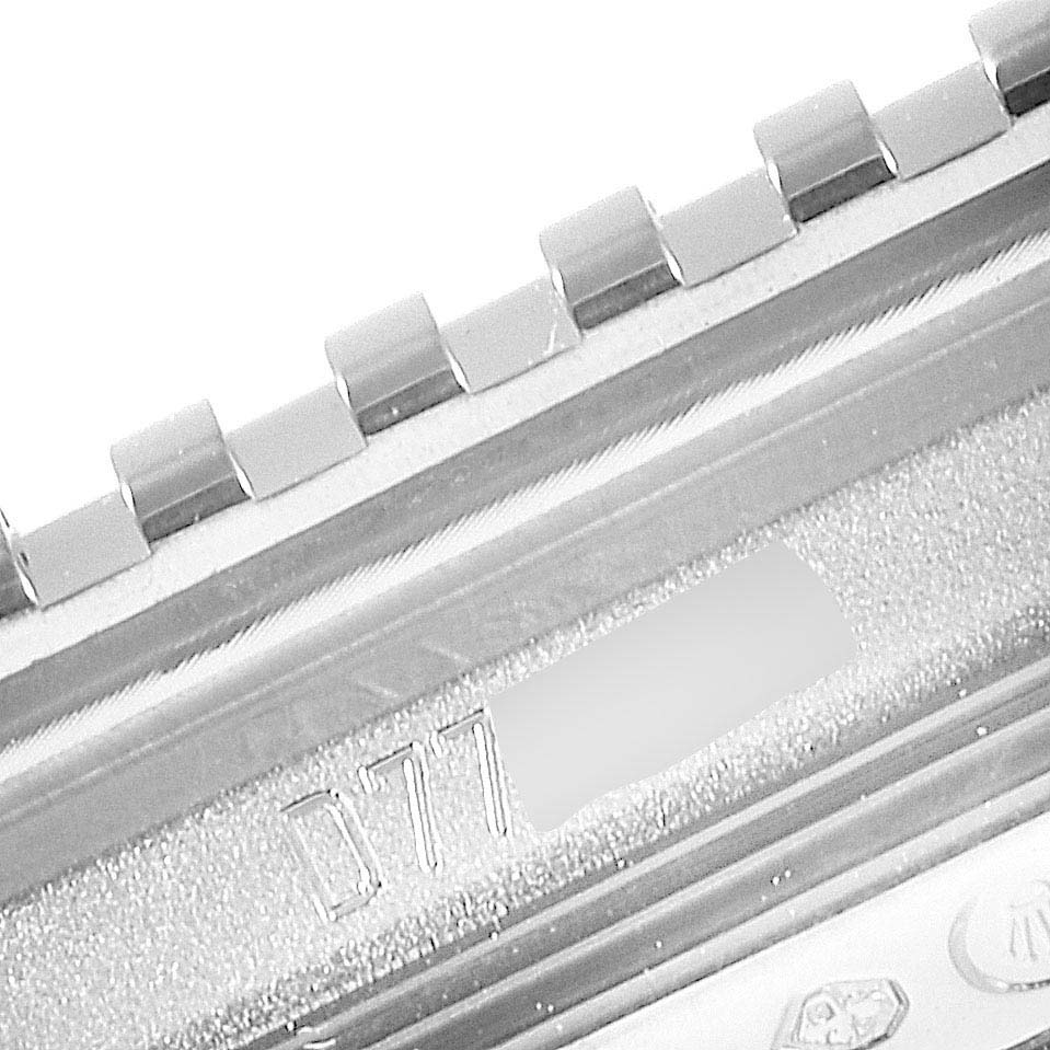 This image shows a close-up of the bracelet and a portion of the clasp of a Rolex Cellini 5441/9 Men's White Gold Silver Dial 5441/9 Men's White Gold Silver Dial watch.