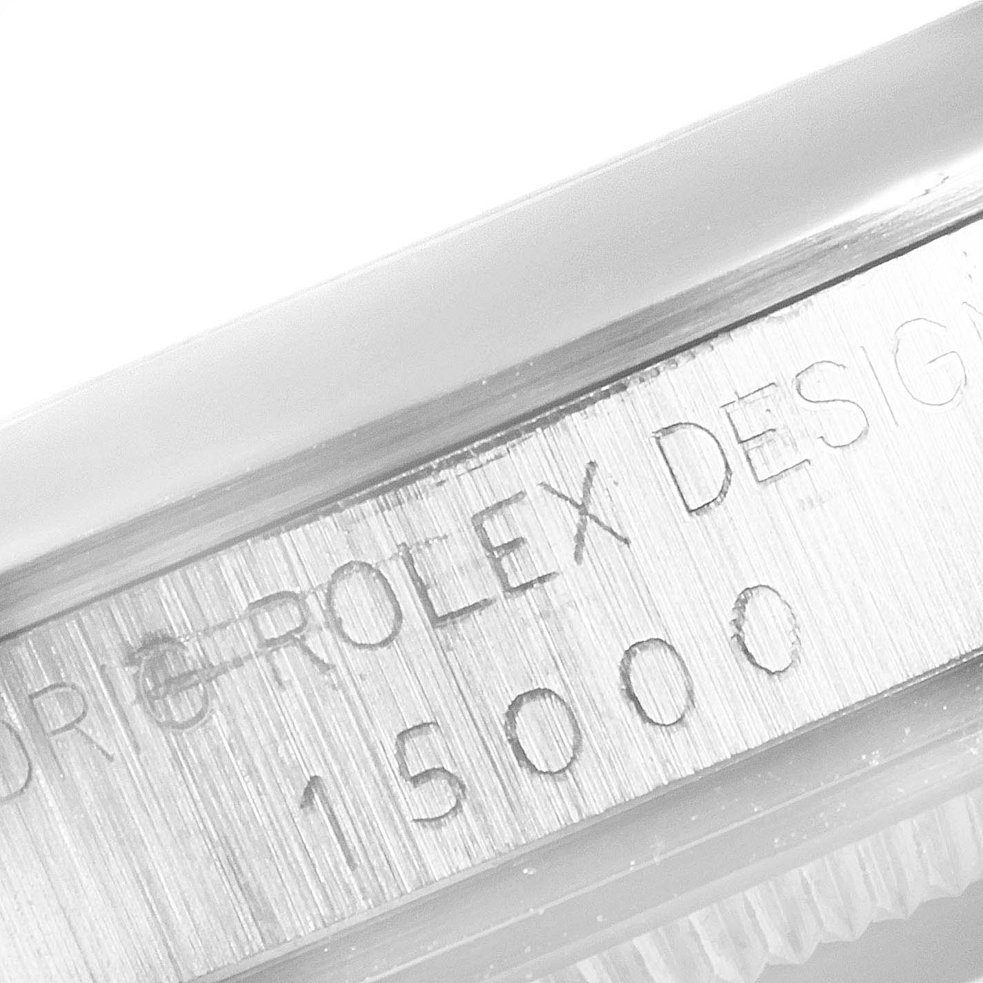 The image shows a close-up angle of the case side of a Vintage Collection model by Rolex, with the model number and "ROLEX DESIGN" engraved.