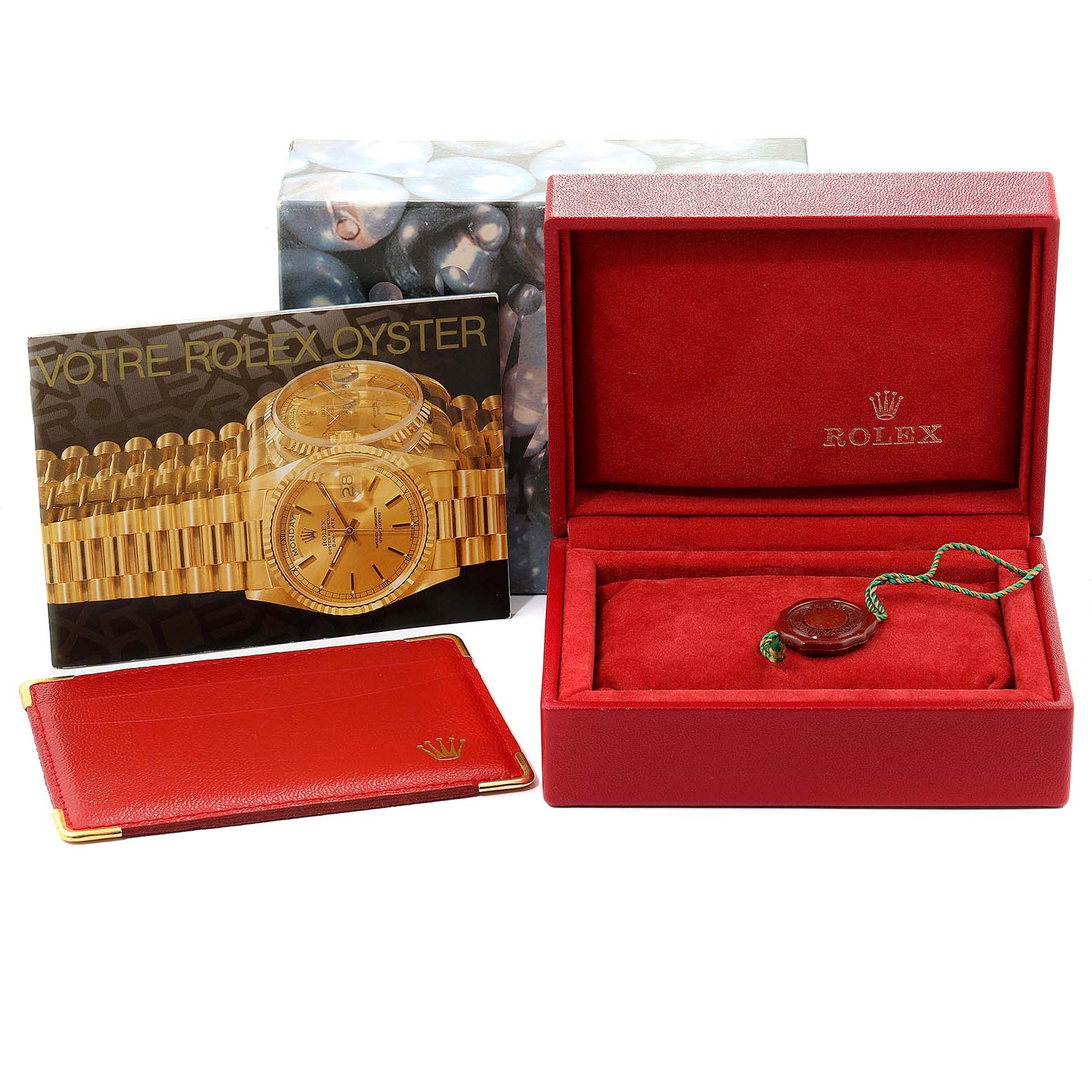 The image displays a Rolex Datejust 79174 Women's Stainless Steel Black Dial 79174 Women's Stainless Steel Black Dial watch box, a booklet, a red cardholder, and a Rolex tag, all from a frontal angle.