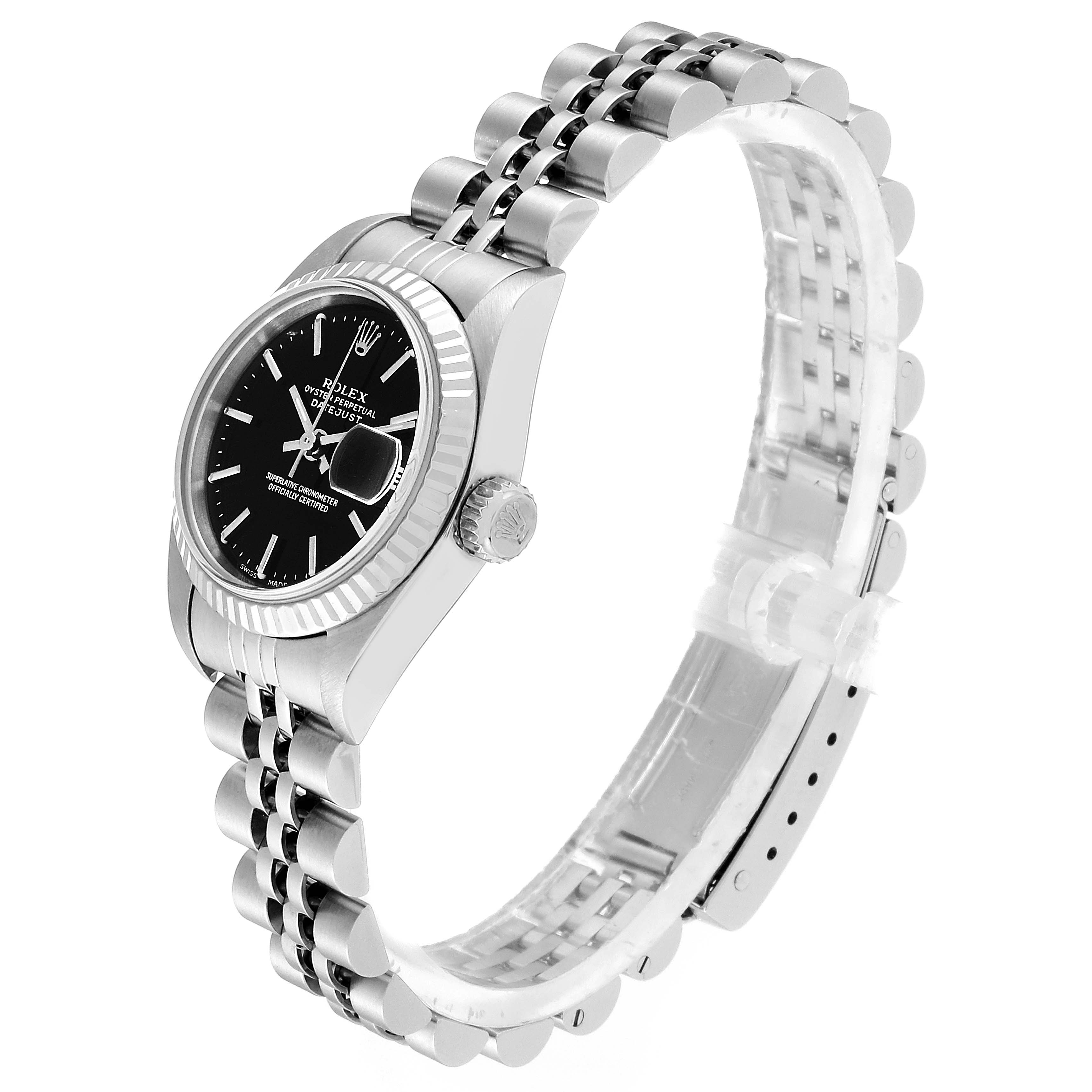 This image shows a side angle of the Rolex Datejust 79174 Women's Stainless Steel Black Dial 79174 Women's Stainless Steel Black Dial watch featuring its face, bezel, crown, and Jubilee bracelet.