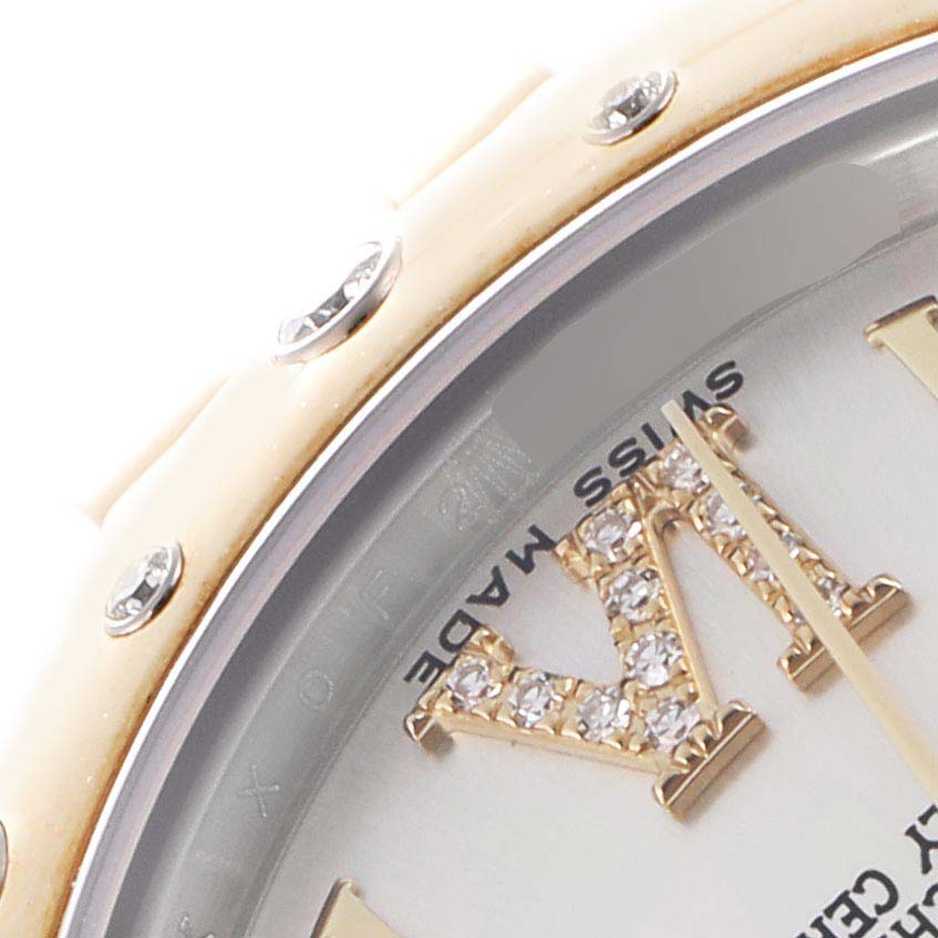 The image shows a close-up of the Rolex Datejust 178343 Men's Steel and Gold (two tone) Silver Dial watch face, focusing on the bezel, part of the dial, and jeweled markers.