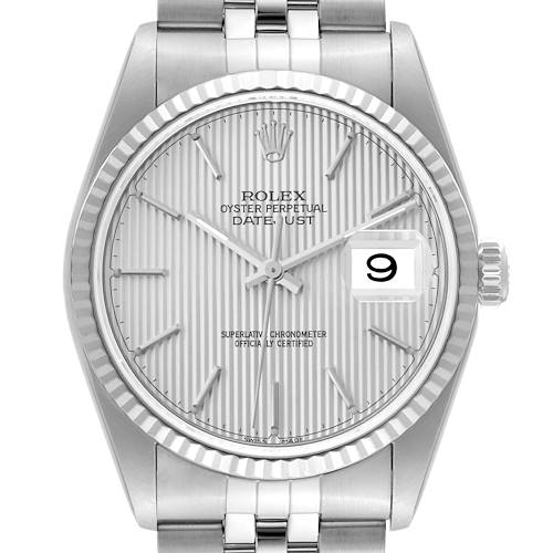 This is a straight-on view of the face of a Rolex Datejust watch, showing the dial, hands, date window, and part of the bracelet.