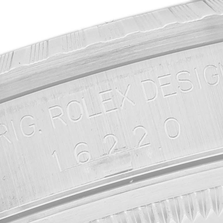 The image shows a close-up view of the inner bezel where "ORIG. ROLEX DESIGN" is engraved on a Rolex Datejust 16220 Men's Stainless Steel White Dial 16220 Men's Stainless Steel White Dial watch.