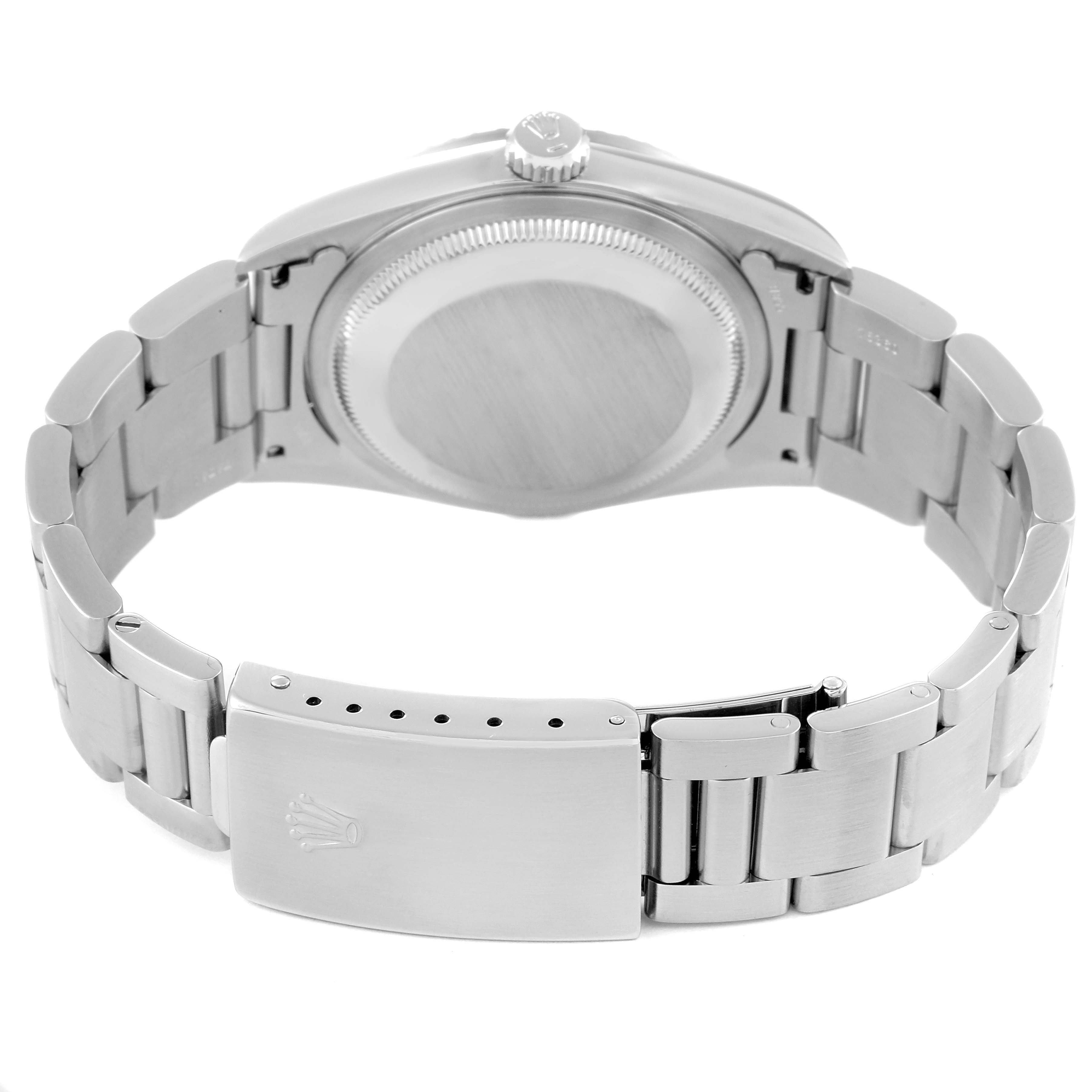 This image shows the back of a Rolex Datejust 16220 Men's Stainless Steel White Dial 16220 Men's Stainless Steel White Dial watch, highlighting the case back and bracelet clasp.