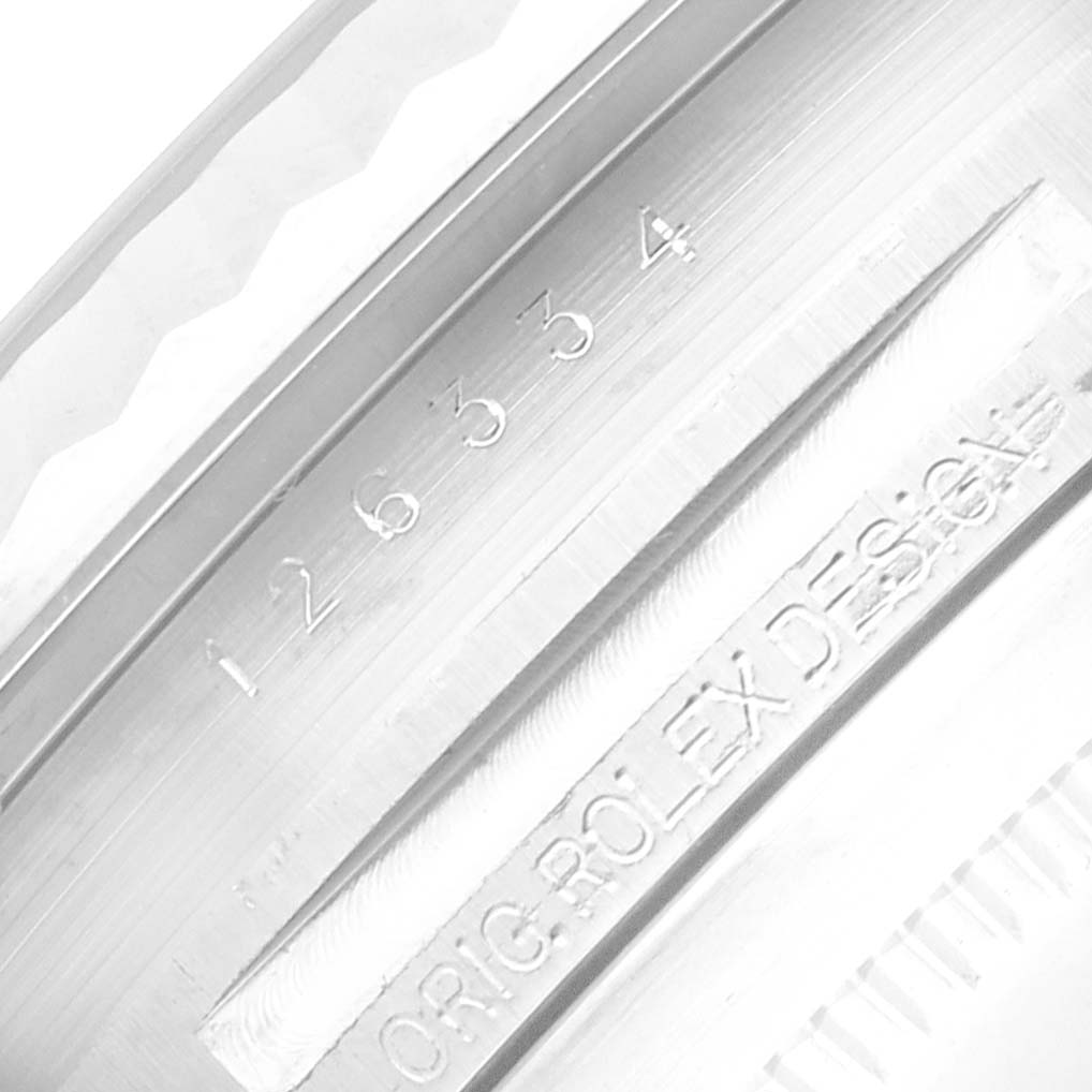 The image shows the engraved inner bezel of a Rolex Datejust 41 126334 Men
s Stainless Steel Grey Dial watch, displaying the model number and "ORIG ROLEX DESIGN."