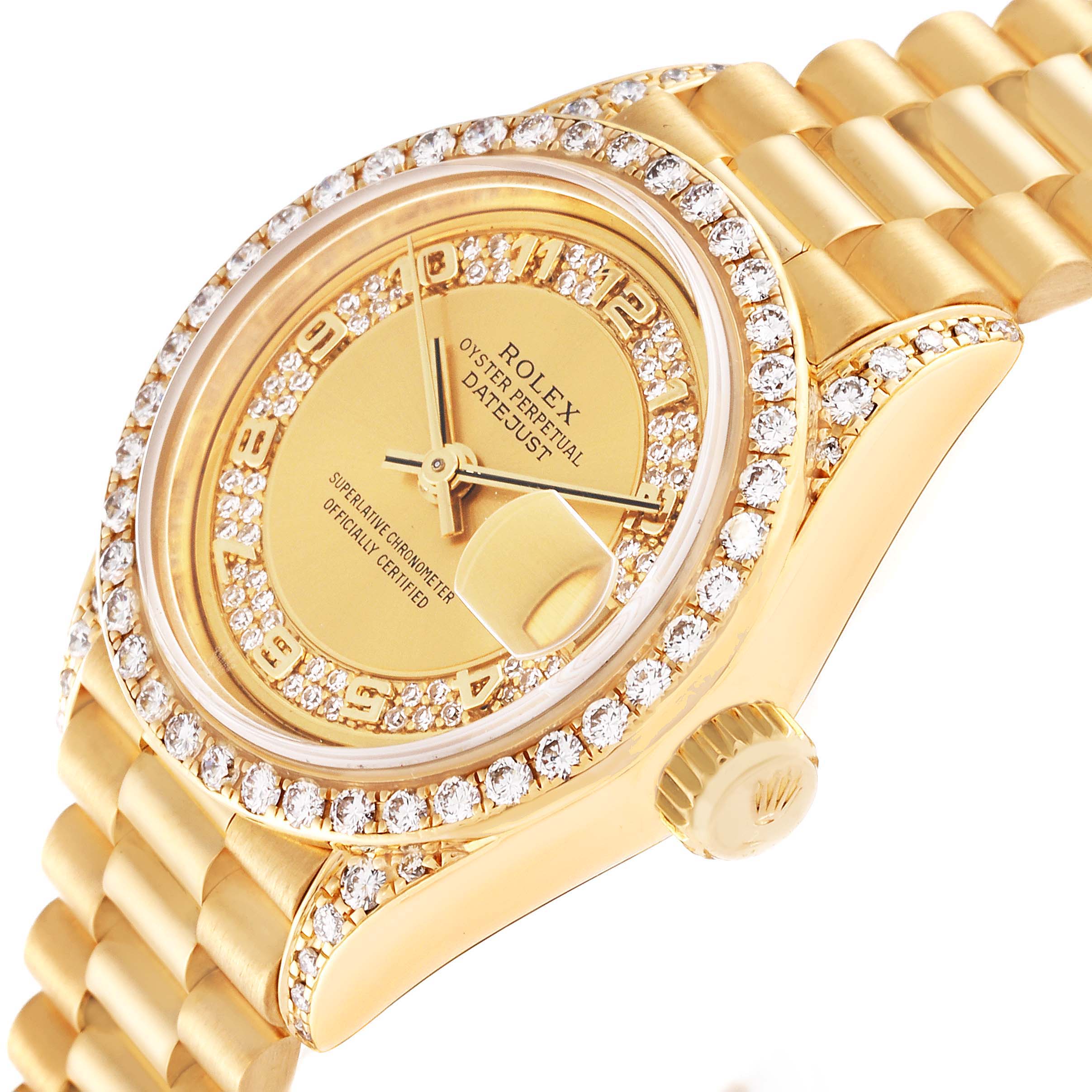 This image shows an angled view of the Rolex President 69158 Women's Yellow Gold Champagne Dial 69158 Women's Yellow Gold Champagne Dial model watch, highlighting the face, bejeweled bezel, dial, and part of the bracelet.