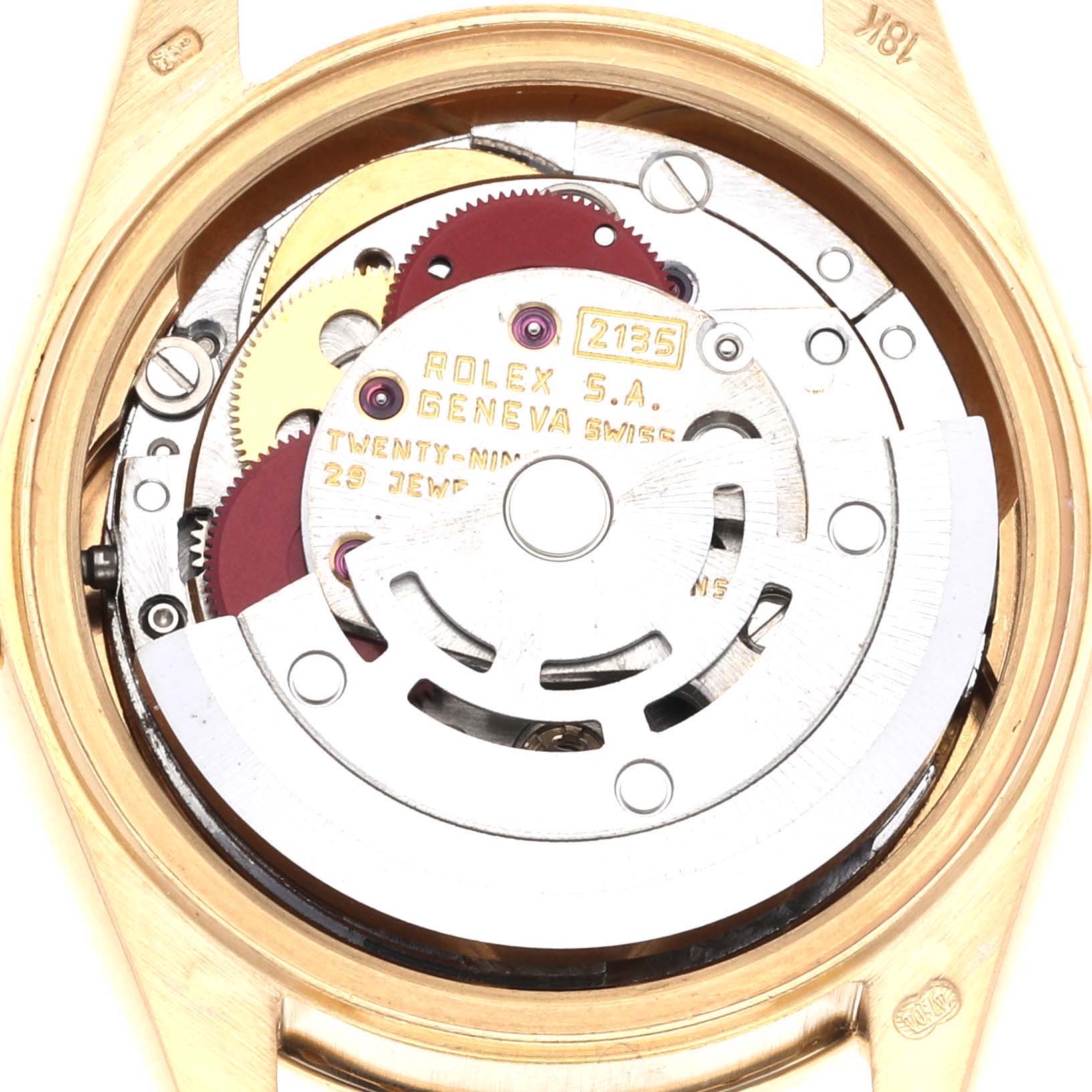 The image shows the back view of a Rolex President 69158 Women's Yellow Gold Champagne Dial 69158 Women's Yellow Gold Champagne Dial model, exposing its intricate movement and internal mechanisms.