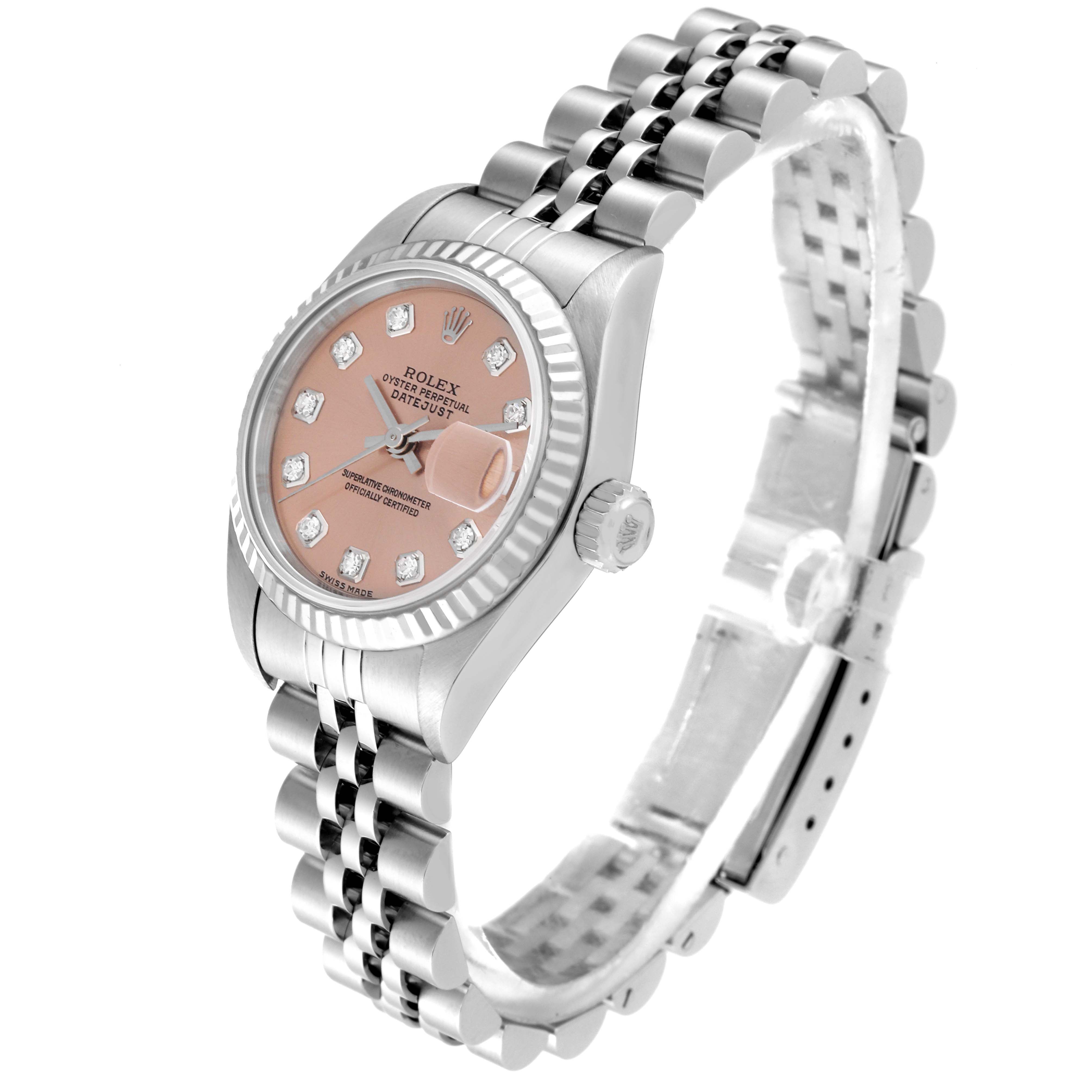 The Rolex Datejust 79174 Women's Stainless Steel Pink Dial 79174 Women's Stainless Steel Pink Dial watch photographed at a three-quarter angle displays the dial, bezel, and jubilee bracelet.