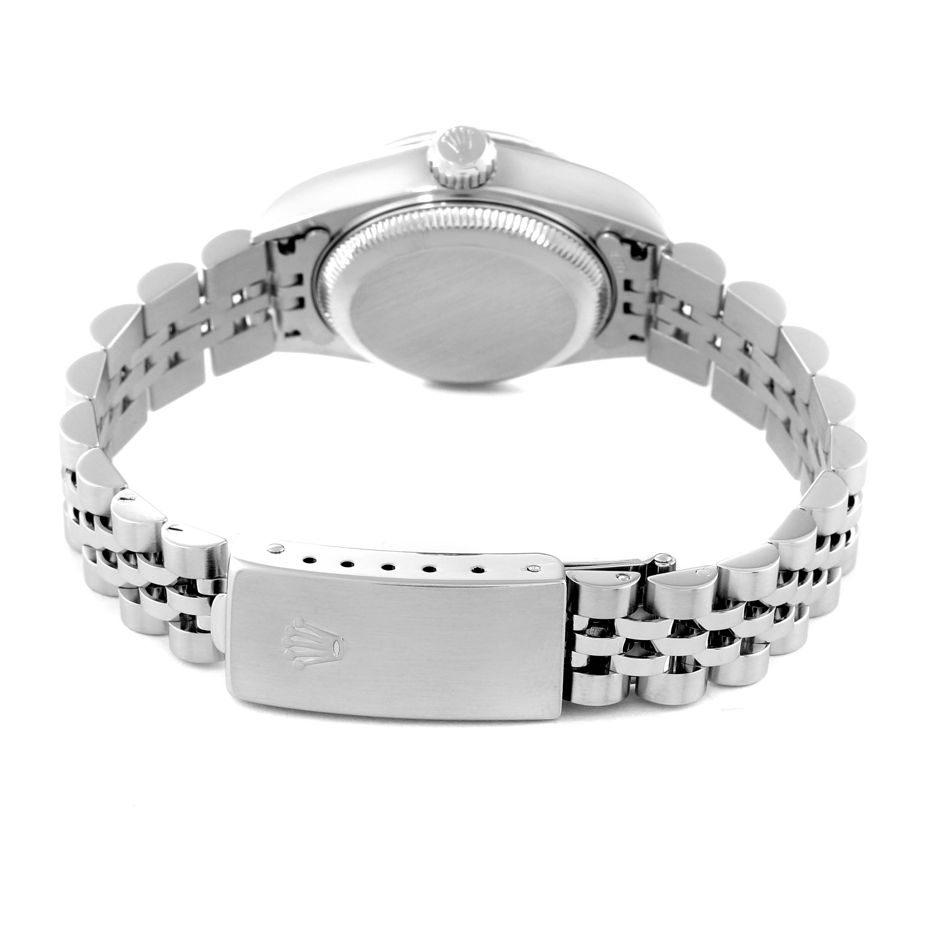 The image shows the back view of a Rolex Datejust 79174 Women's Stainless Steel Pink Dial 79174 Women's Stainless Steel Pink Dial watch, highlighting the case back and the Jubilee bracelet with a clasp.