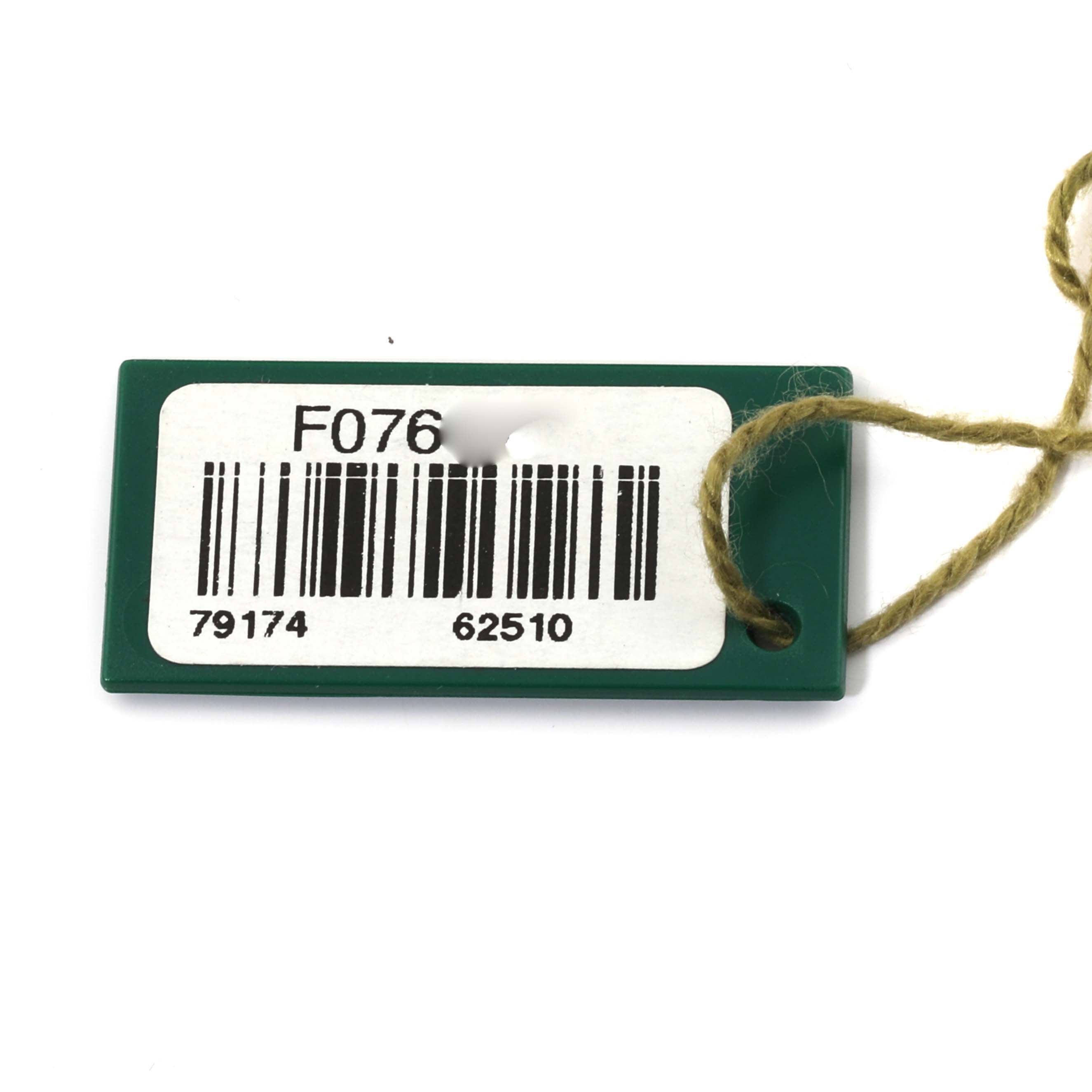 The image shows a green Rolex Datejust 79174 Women's Stainless Steel Pink Dial 79174 Women's Stainless Steel Pink Dial model tag with a barcode and reference numbers.