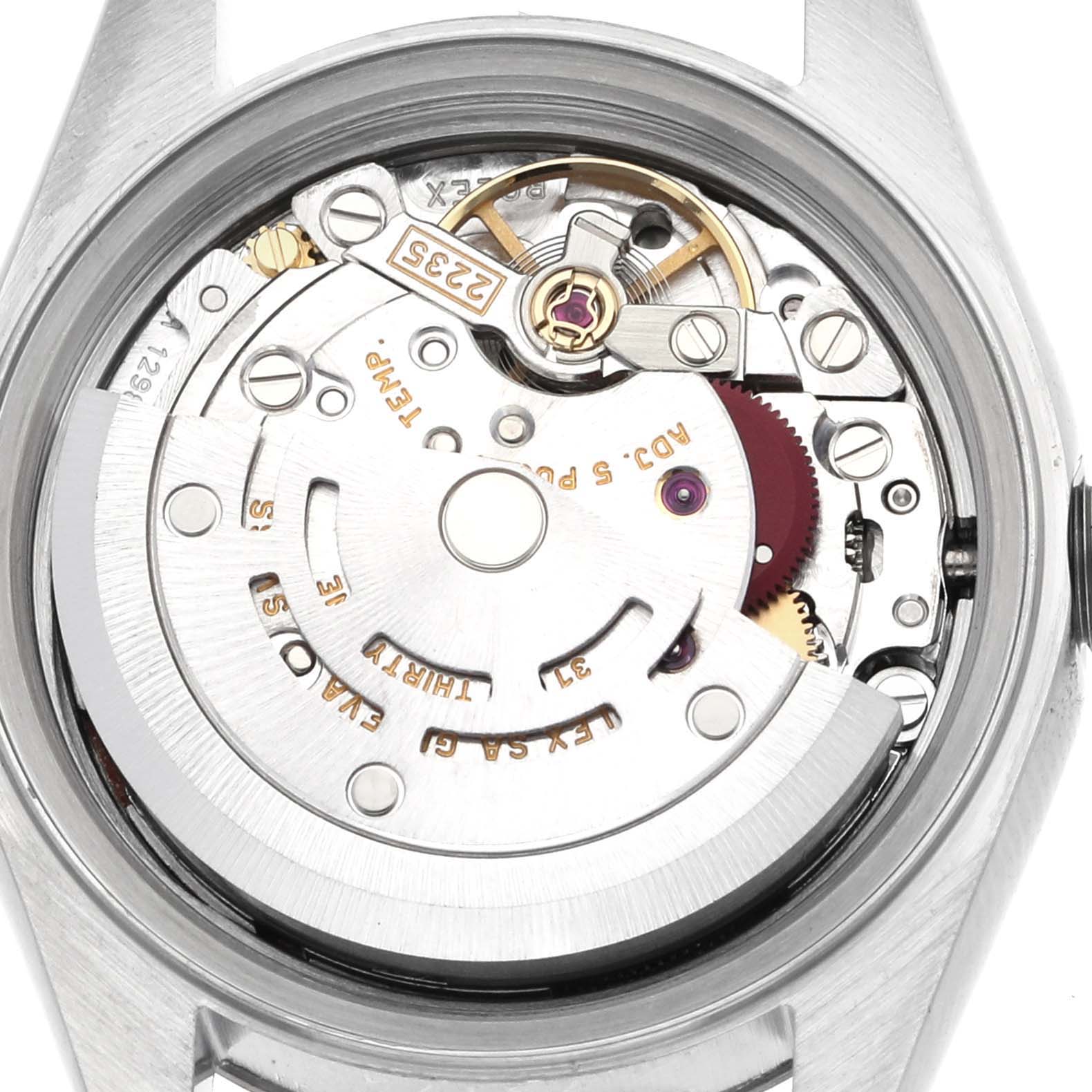 The image shows the internal mechanism of a Rolex Datejust 79174 Women's Stainless Steel Pink Dial 79174 Women's Stainless Steel Pink Dial watch from a rear, close-up angle, displaying its intricate movement components.