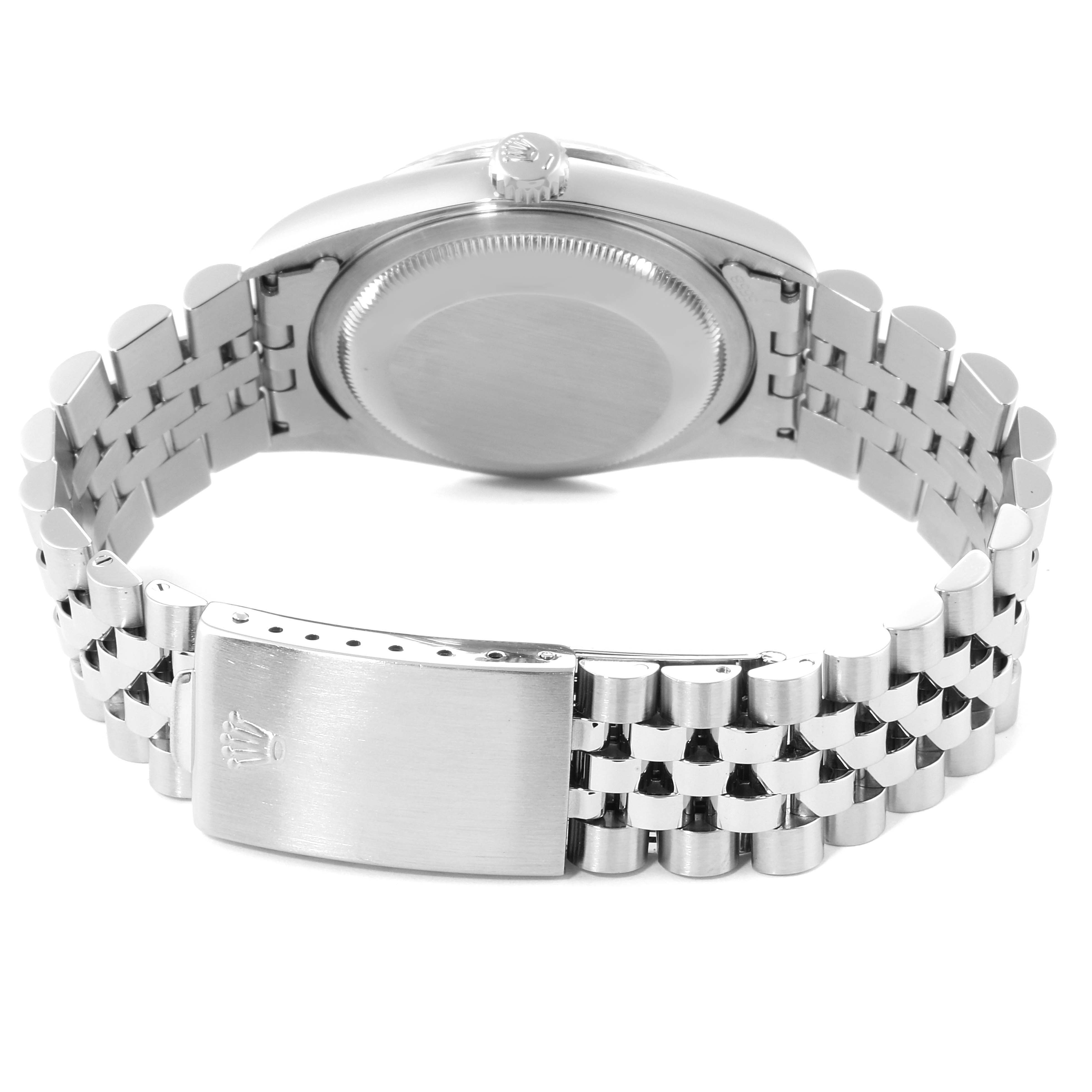 The image shows the back view of a Rolex Datejust 16234  Men's Stainless Steel Silver Dial 16234  Men's Stainless Steel Silver Dial watch, focusing on the case back and bracelet clasp.