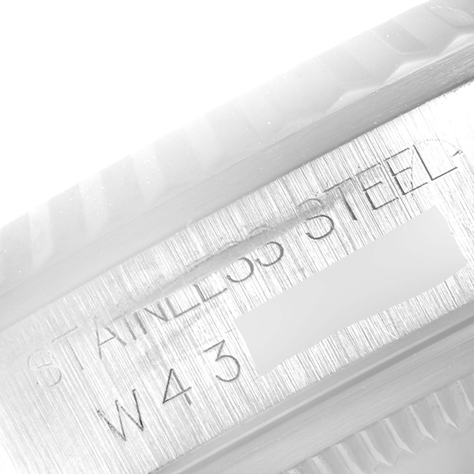 The image shows a close-up of the stainless steel case and inner bezel of a Rolex Datejust 16234  Men's Stainless Steel Silver Dial 16234  Men's Stainless Steel Silver Dial watch.