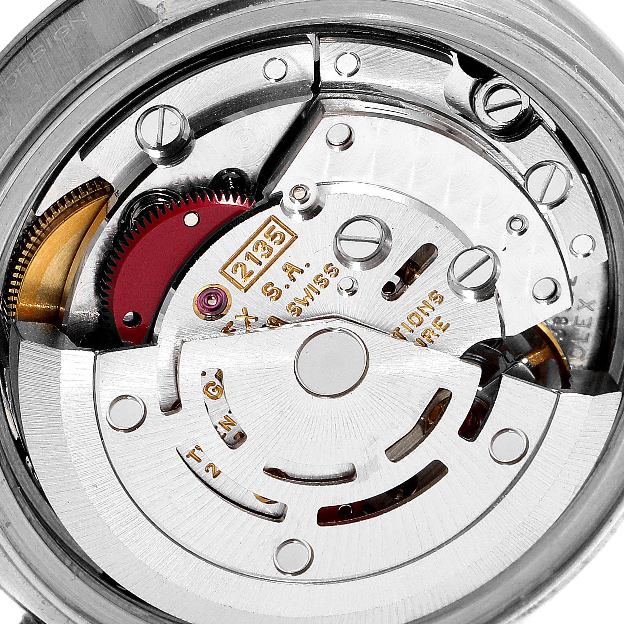 This image shows the intricate internal mechanism of a Rolex Datejust 69174 Women's Stainless Steel Black Dial 69174 Women's Stainless Steel Black Dial watch, featuring its movement parts.