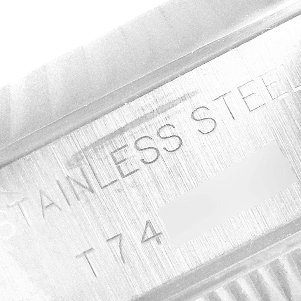 The image shows a close-up of the case side engraving on a Rolex Datejust 69174 Women's Stainless Steel Black Dial 69174 Women's Stainless Steel Black Dial watch, highlighting the "Stainless Steel" marking.