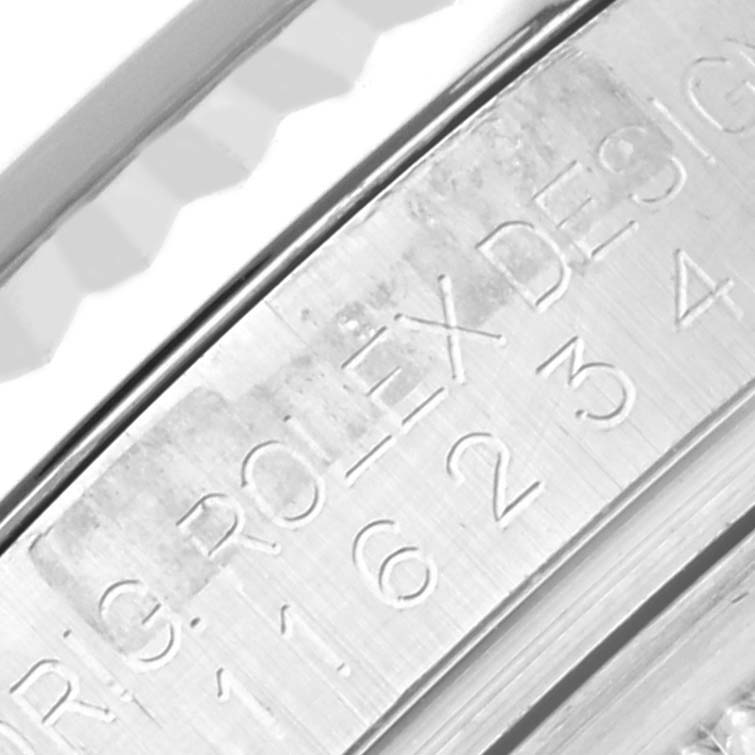 This close-up image shows the inner rim with engravings of a Rolex Datejust 116234 Men's Stainless Steel Blue Dial 116234 Men's Stainless Steel Blue Dial watch.