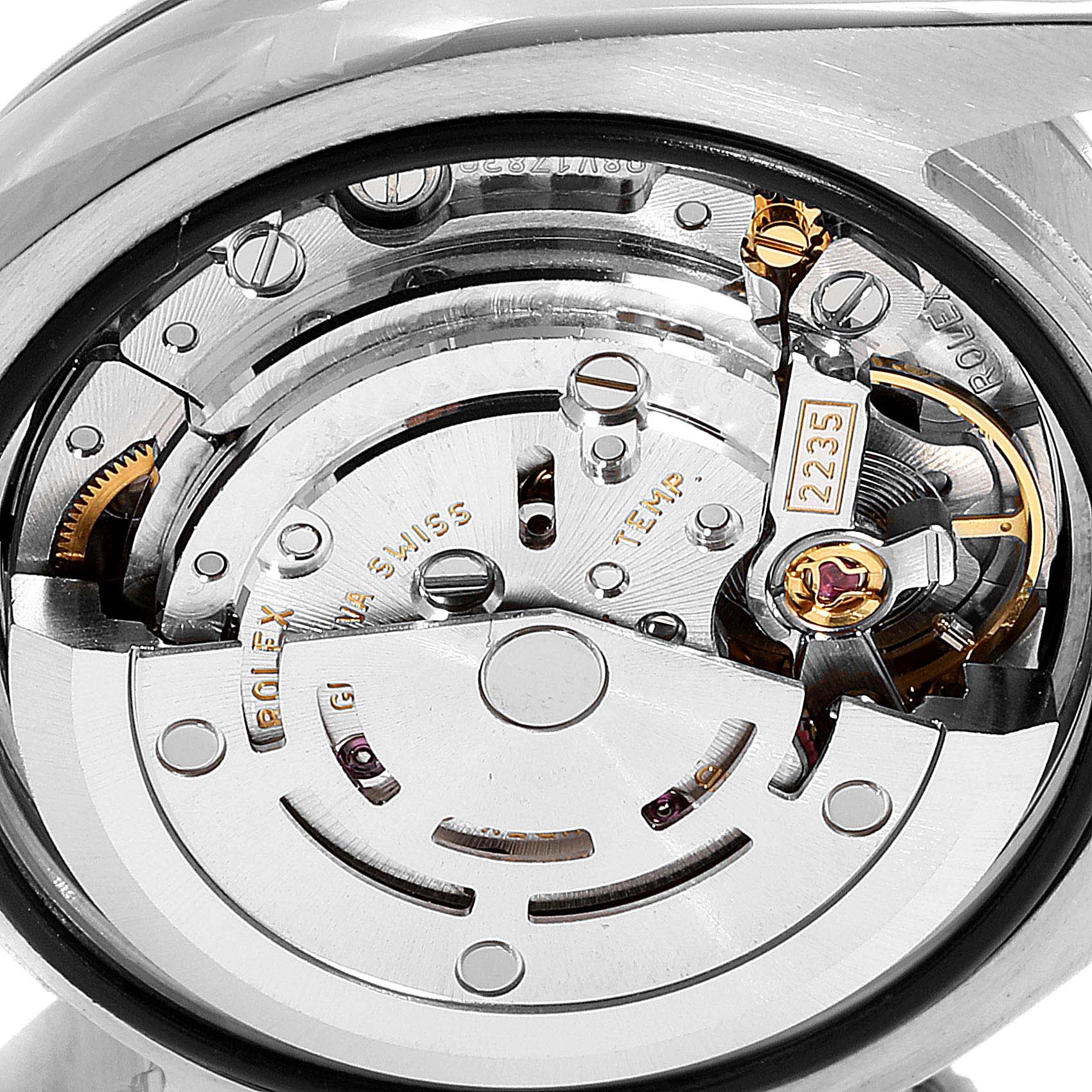 This image shows the detailed inner mechanism of a Rolex Datejust 179174  Women's Stainless Steel Black Dial 179174  Women's Stainless Steel Black Dial watch, focusing on the movement components.