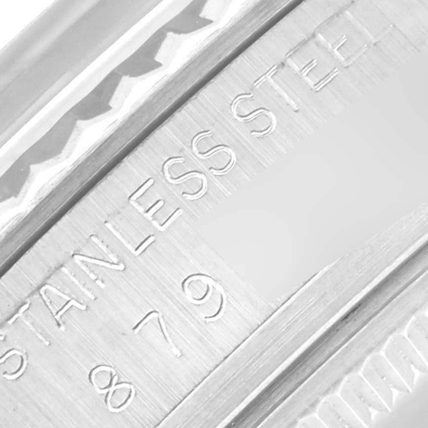 The image shows a close-up of the inner bezel of a Rolex Datejust 16014 Men's Stainless Steel Silver Dial 16014 Men's Stainless Steel Silver Dial watch, highlighting "STAINLESS STEEL" and numbers.