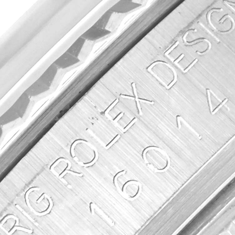 This close-up angle shows the serial engraving on the side of the Rolex Datejust 16014 Men's Stainless Steel Silver Dial 16014 Men's Stainless Steel Silver Dial model case.