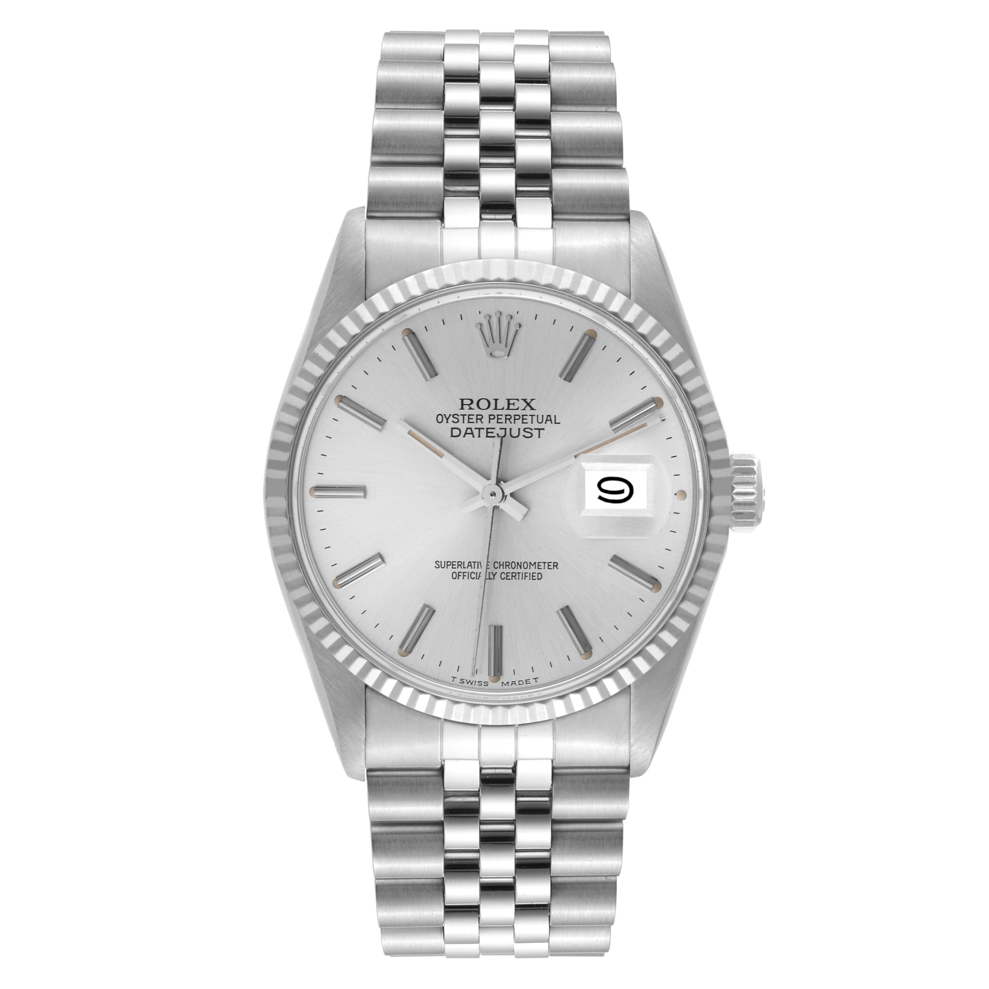 The image shows a front view of a Rolex Datejust 16014 Men's Stainless Steel Silver Dial 16014 Men's Stainless Steel Silver Dial watch, featuring its silver dial, fluted bezel, and Jubilee bracelet.