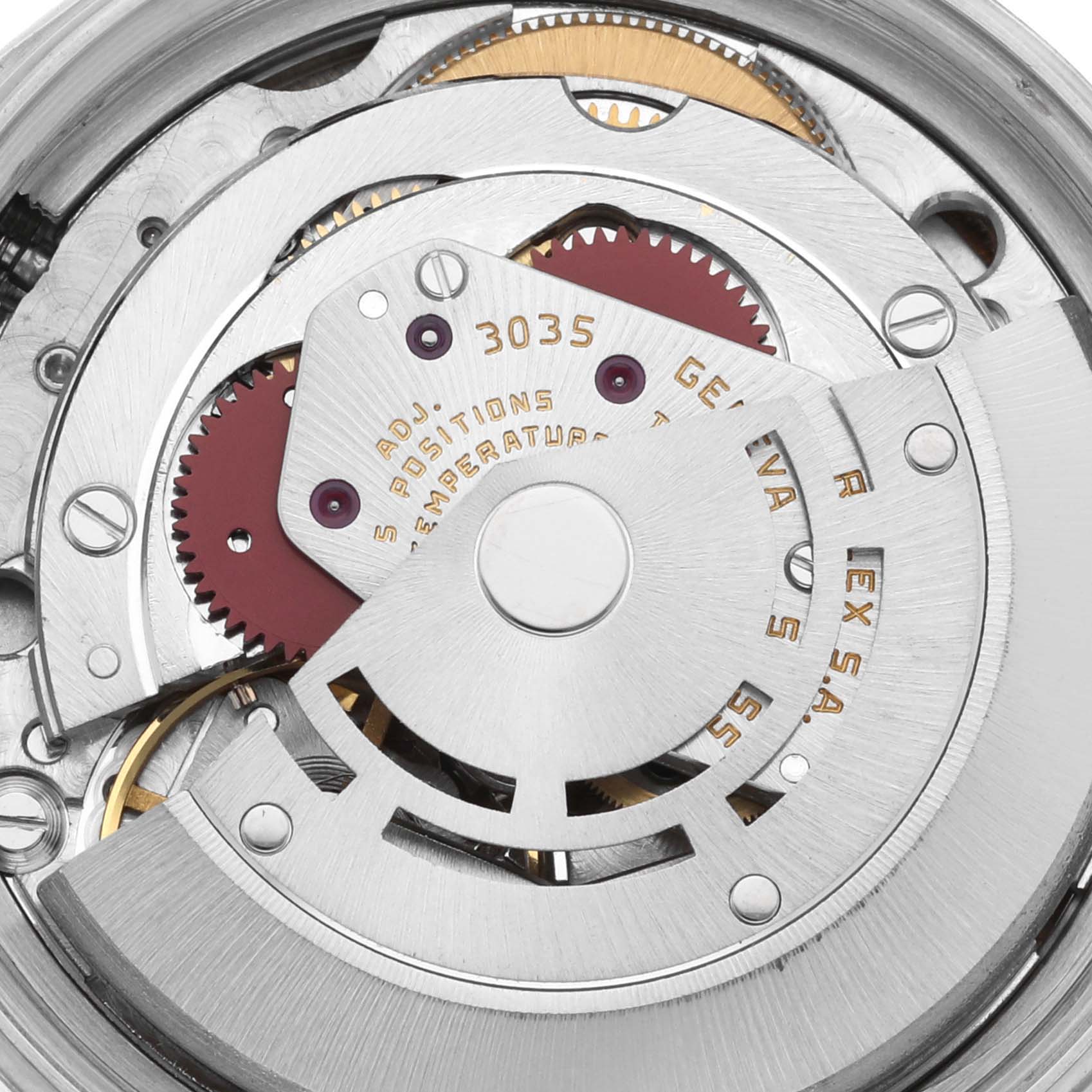 This image shows the intricate movement mechanism of the Rolex Datejust 16014 Men's Stainless Steel Silver Dial 16014 Men's Stainless Steel Silver Dial watch, highlighting its gears and rotors.