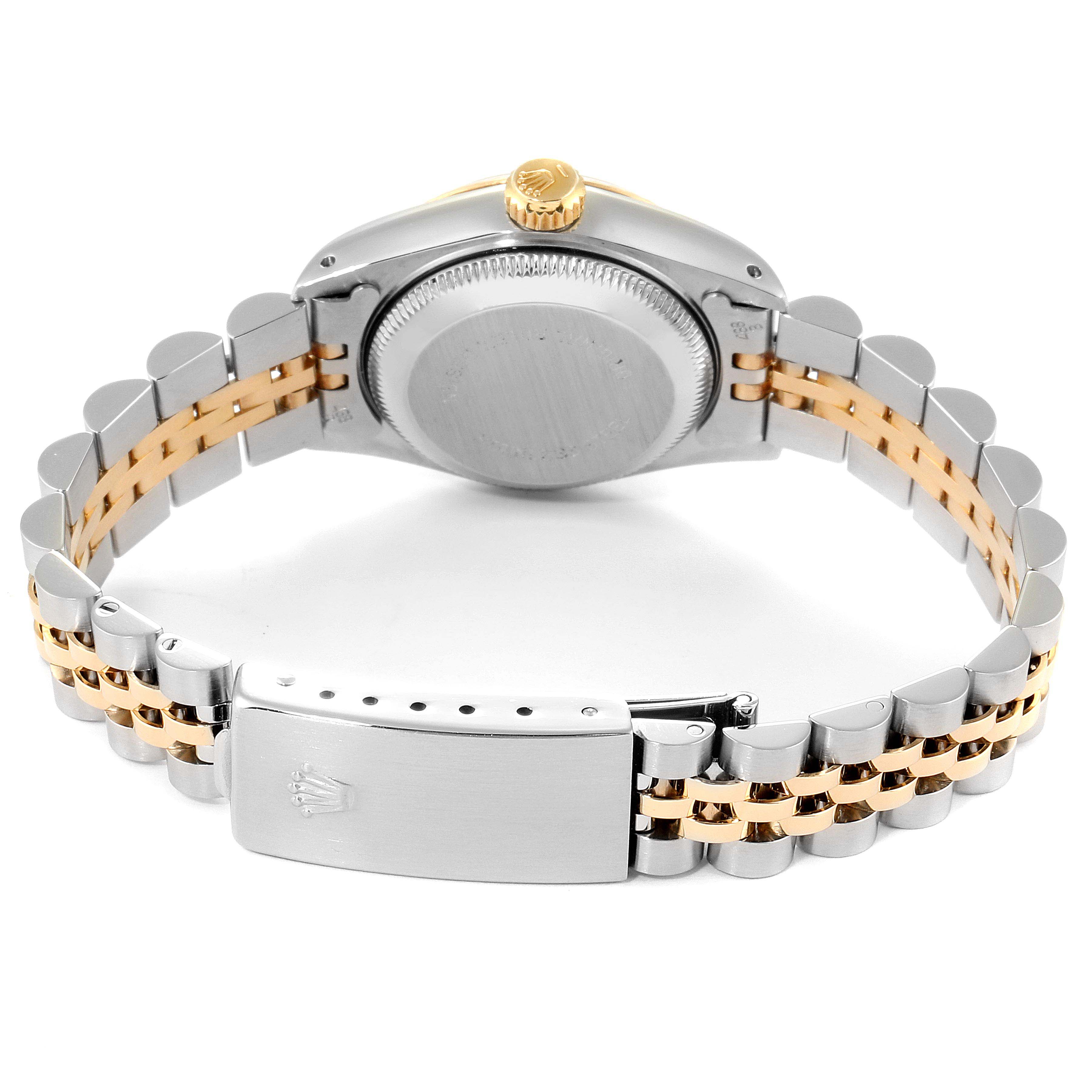 The image shows the back case and bracelet clasp of the Rolex Datejust 69173 Women
s Steel and Gold (two tone) Champagne Dial 69173 Women
s Steel and Gold (two tone) Champagne Dial watch, with two-tone metal links.