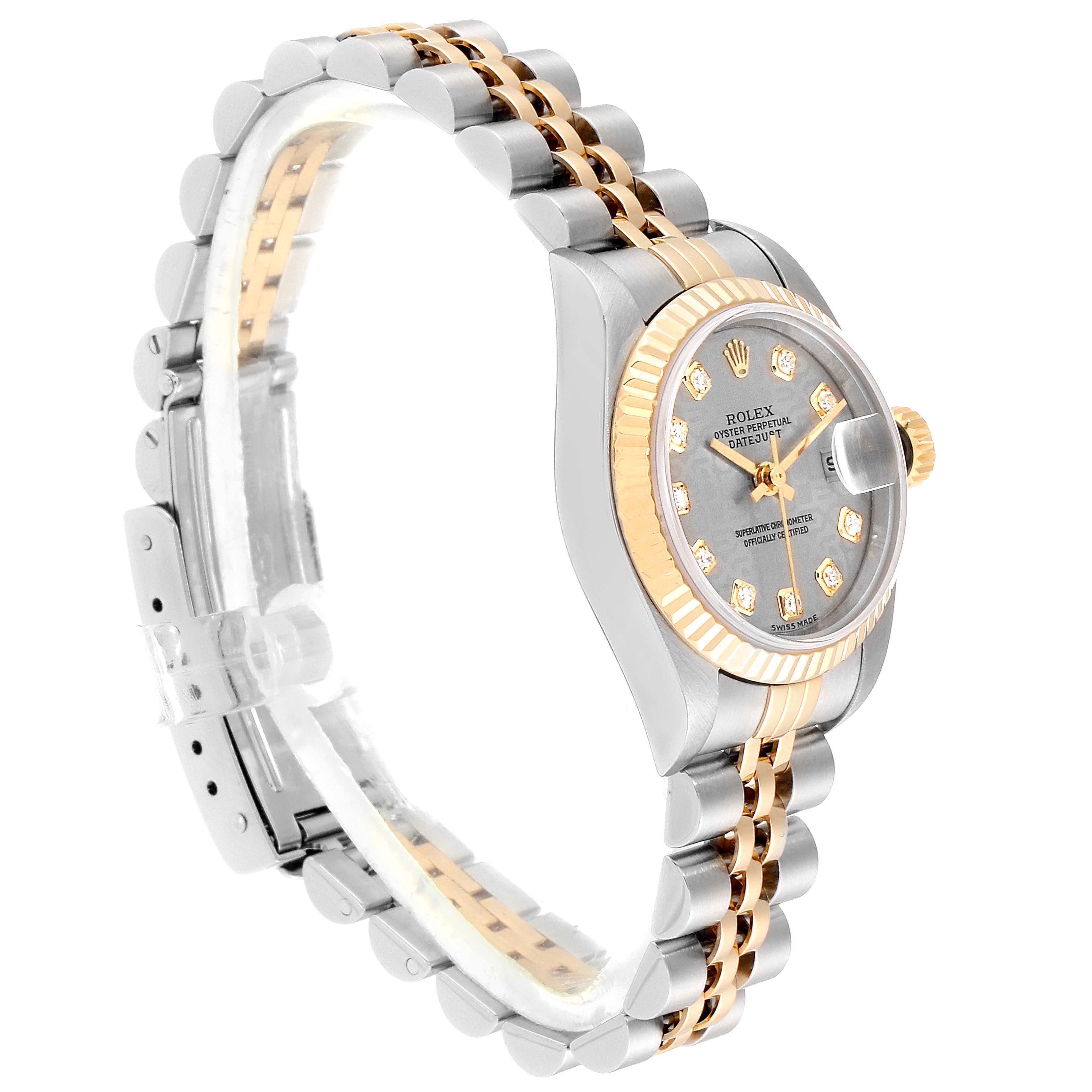 The image shows a side view of a Rolex Datejust 79173 Women
s Steel and Gold (two tone) Silver Dial 79173 Women
s Steel and Gold (two tone) Silver Dial watch, highlighting its dial, bezel, and two-tone bracelet.