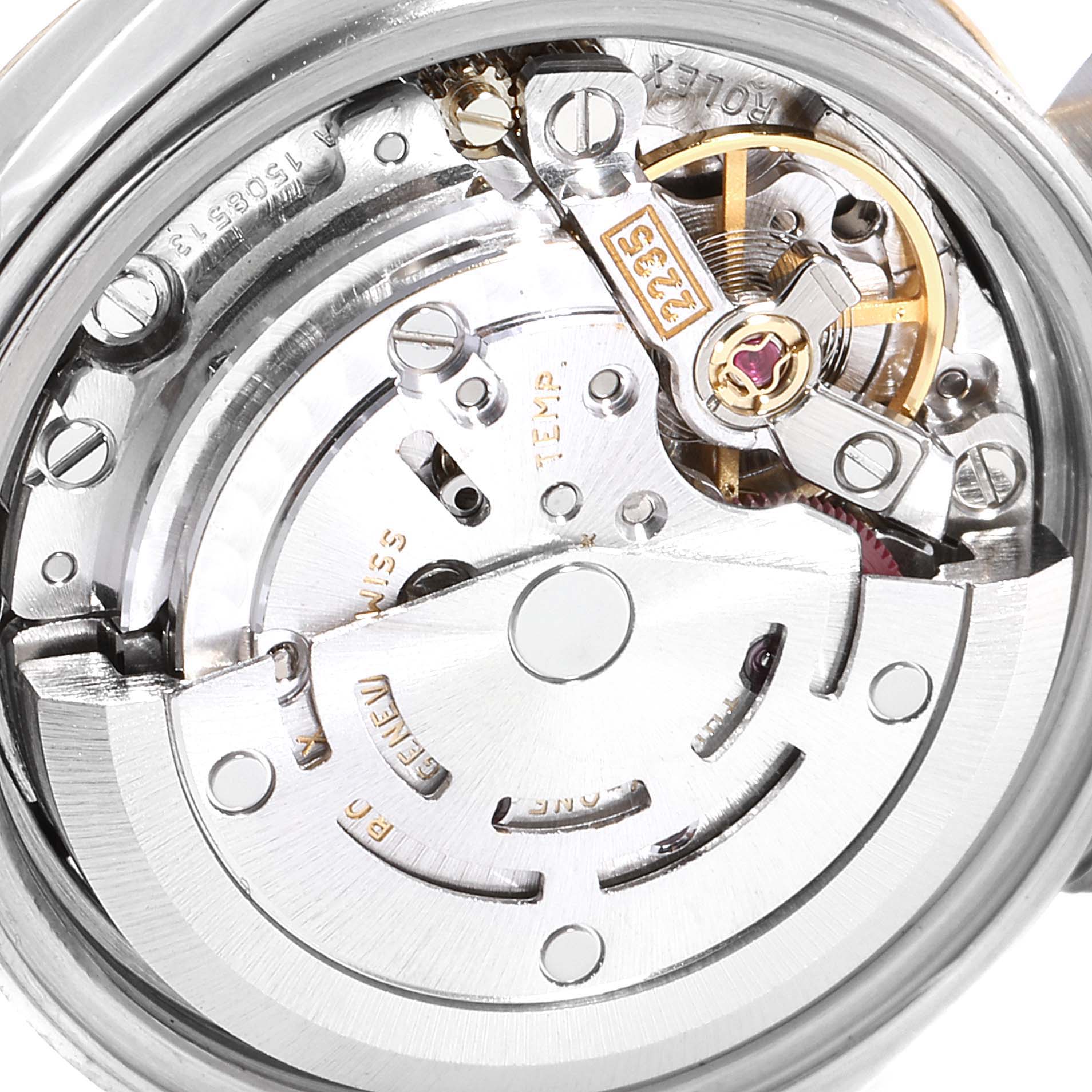 The image shows a close-up of the internal movement components of a Rolex Datejust 79173 Women
s Steel and Gold (two tone) Silver Dial 79173 Women
s Steel and Gold (two tone) Silver Dial watch.