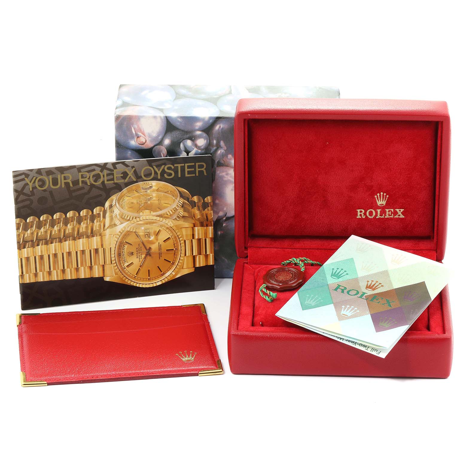 The image shows a Rolex Datejust 79173 Women
s Steel and Gold (two tone) Silver Dial 79173 Women
s Steel and Gold (two tone) Silver Dial watch box, certificates, warranty card holder, and an accompanying booklet.