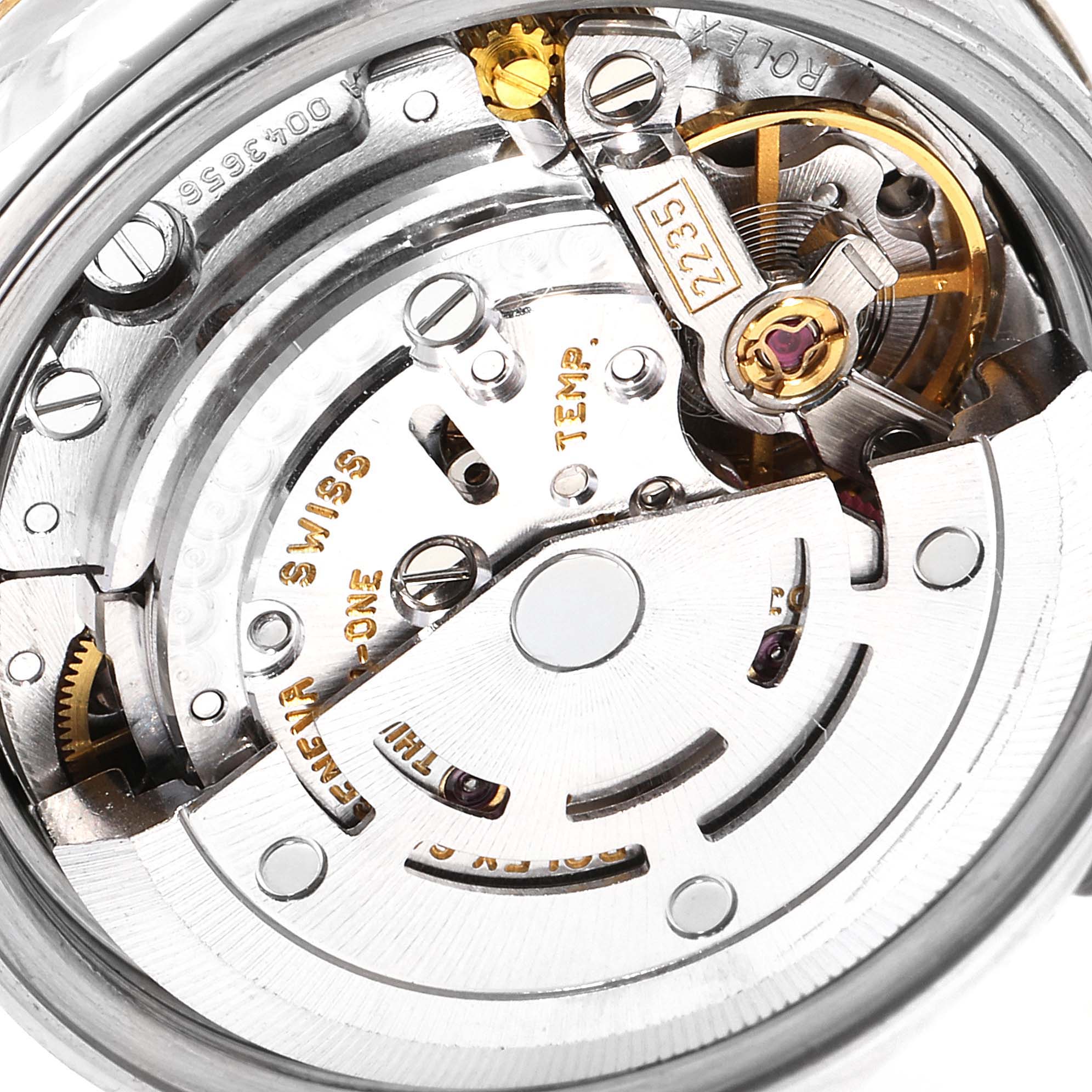 The image shows the internal mechanism of a Rolex Datejust 79173 Women's Steel and Gold (two tone) Champagne Dial 79173 Women's Steel and Gold (two tone) Champagne Dial watch from a close-up angle.