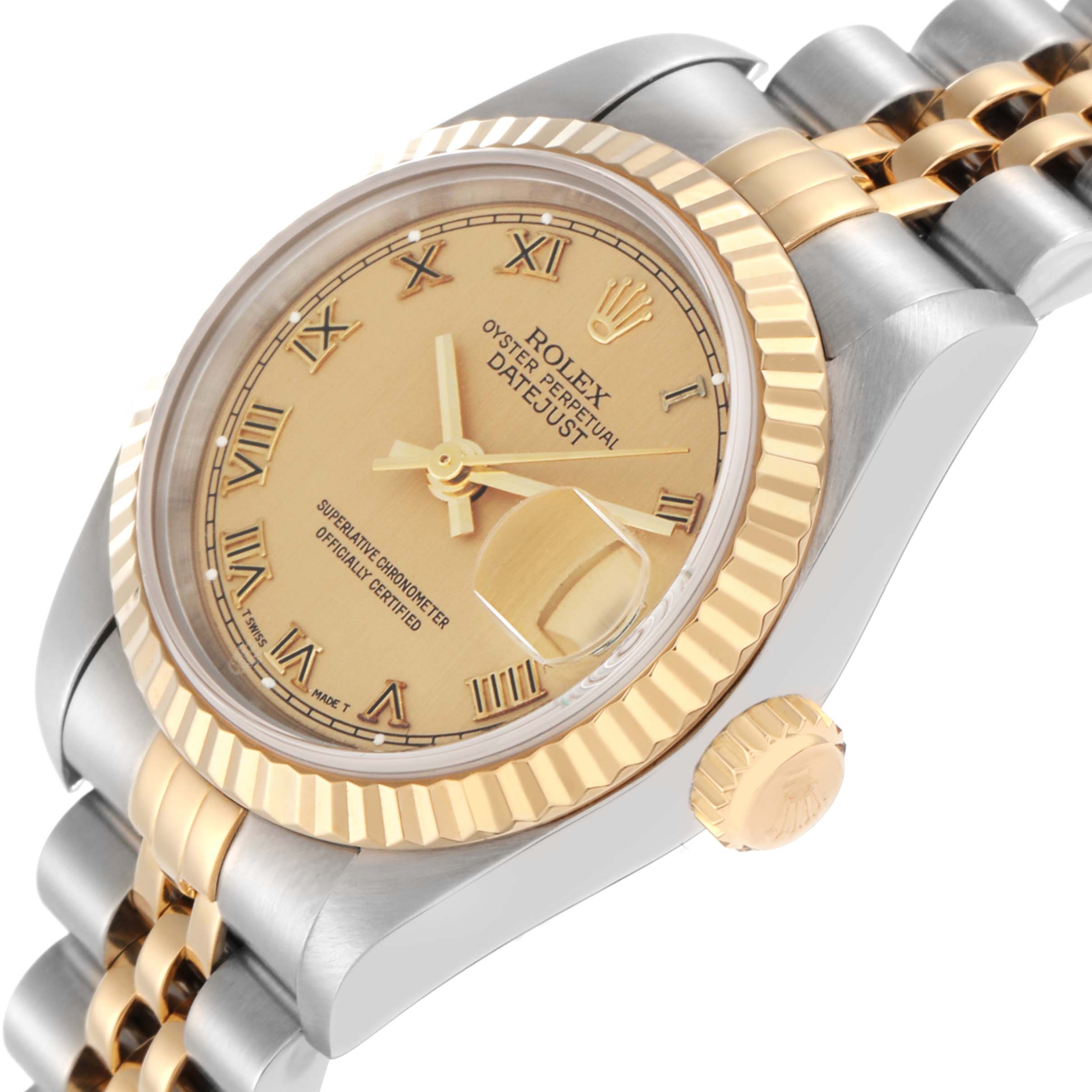 The Rolex Datejust 79173 Women
s Steel and Gold (two tone) Champagne Dial is shown at a slight angle, displaying the dial, bezel, crown, and part of the bracelet.
